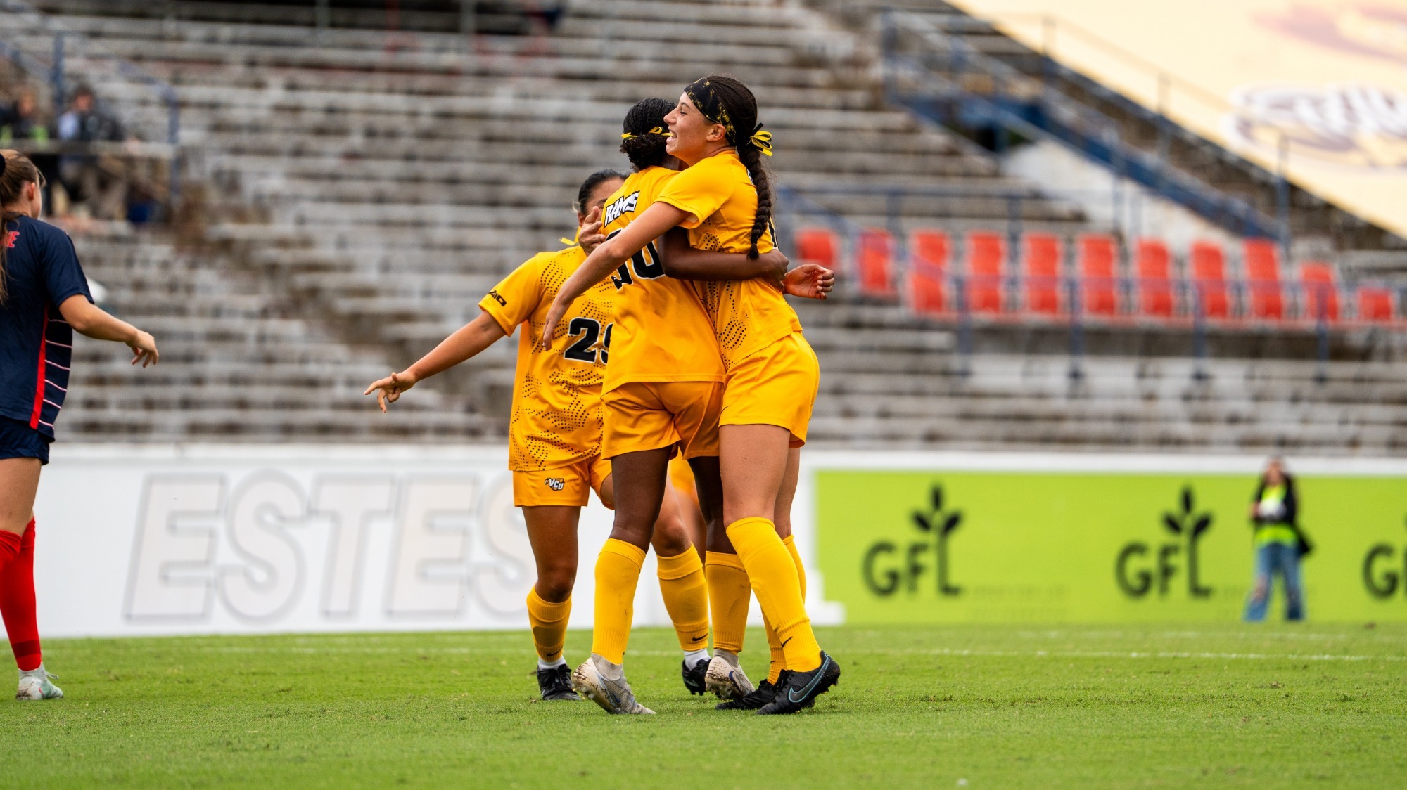 Monique McEnhimer, Isabelle Franklin celebrate goal vs. Duquesne