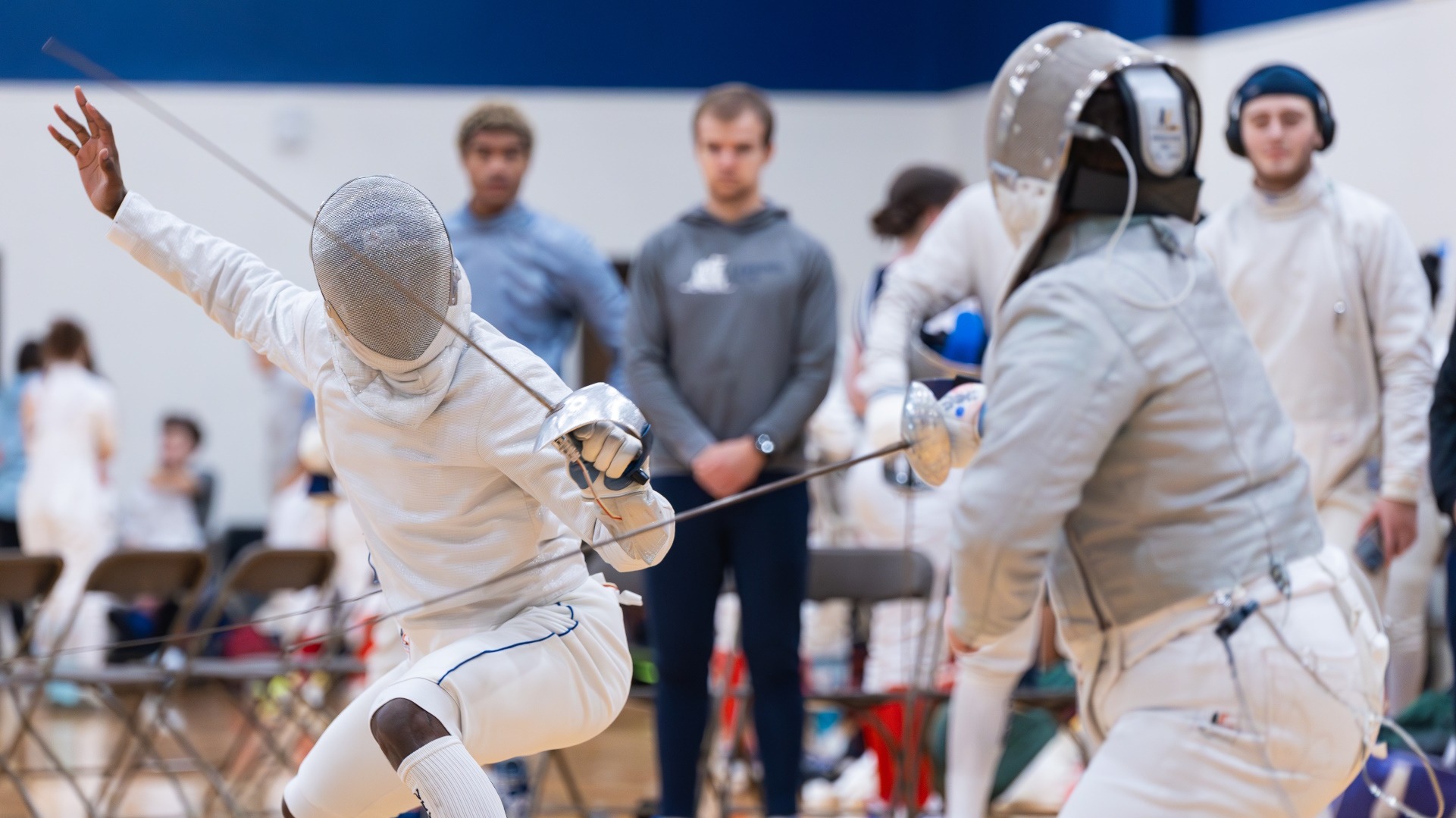Lawrence men, women both collect three victories at DeCicco Duals