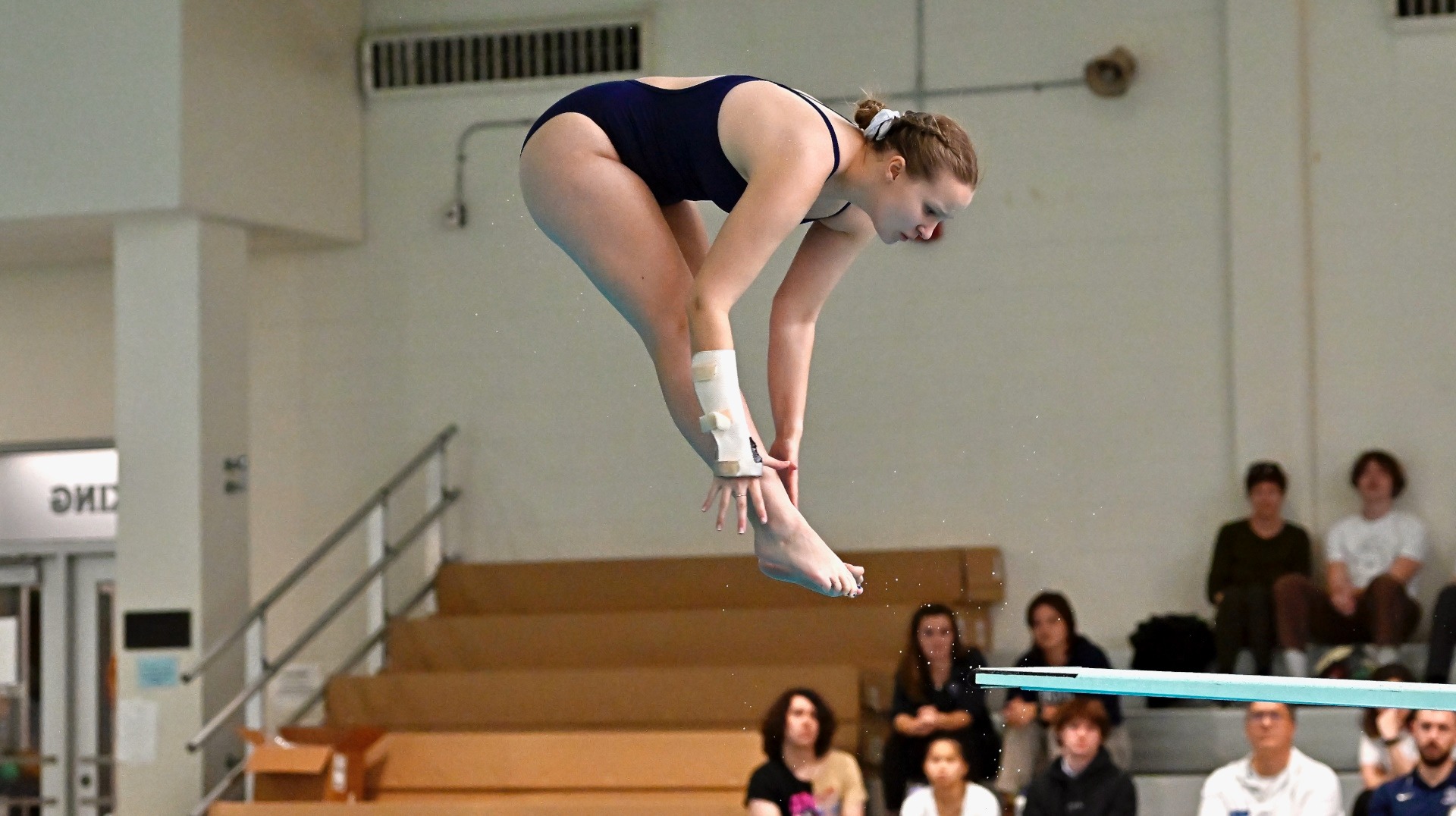 Lawrence women's diving action Olivia Martin