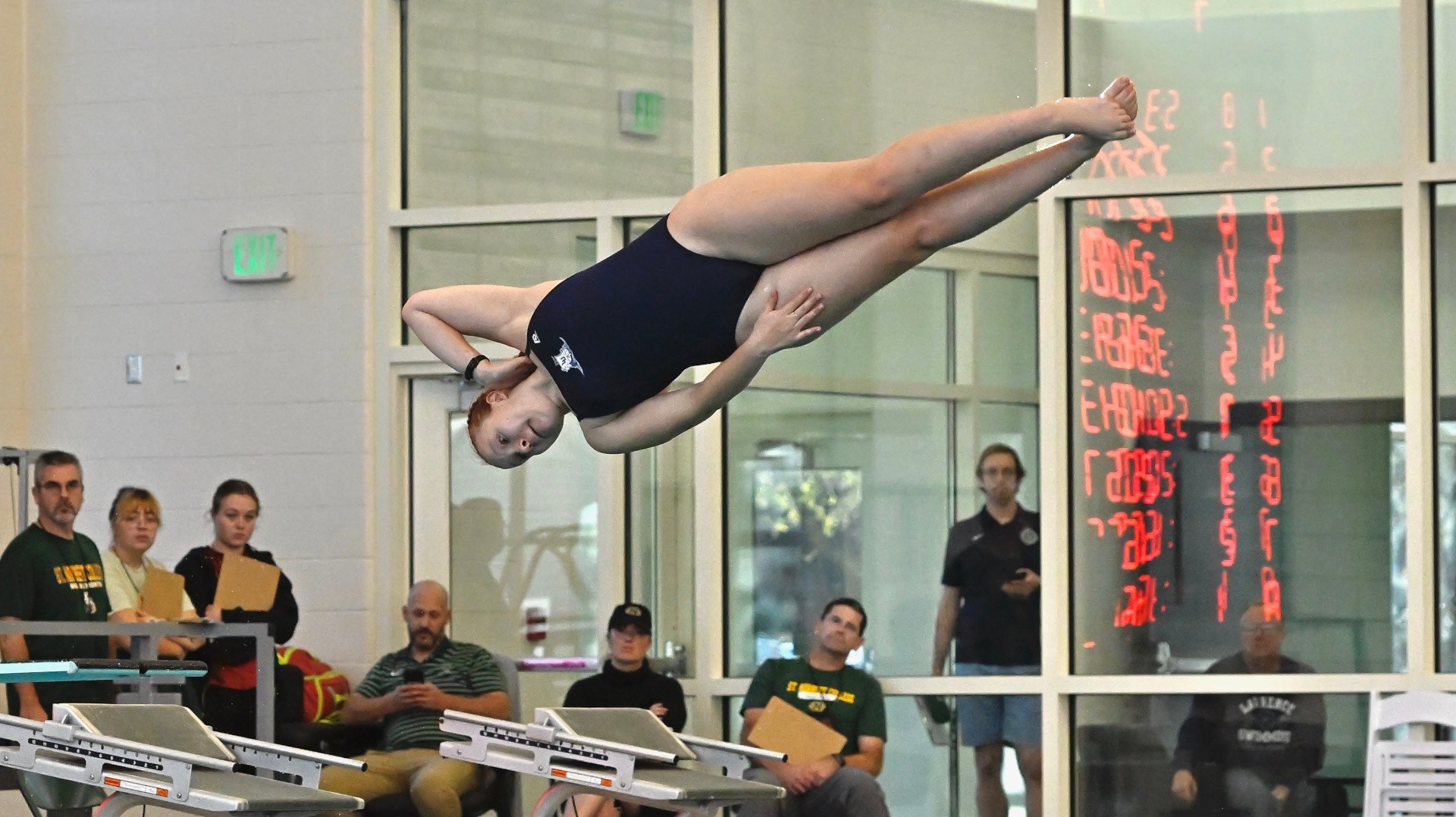 Lawrence women's diving action Olivia Martin