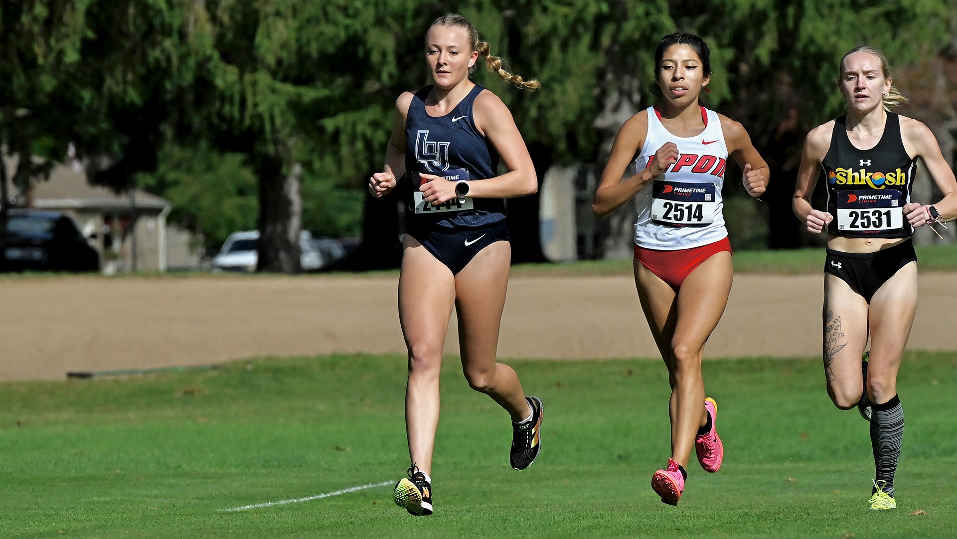 Lawrence women's cross country action Mila Westra