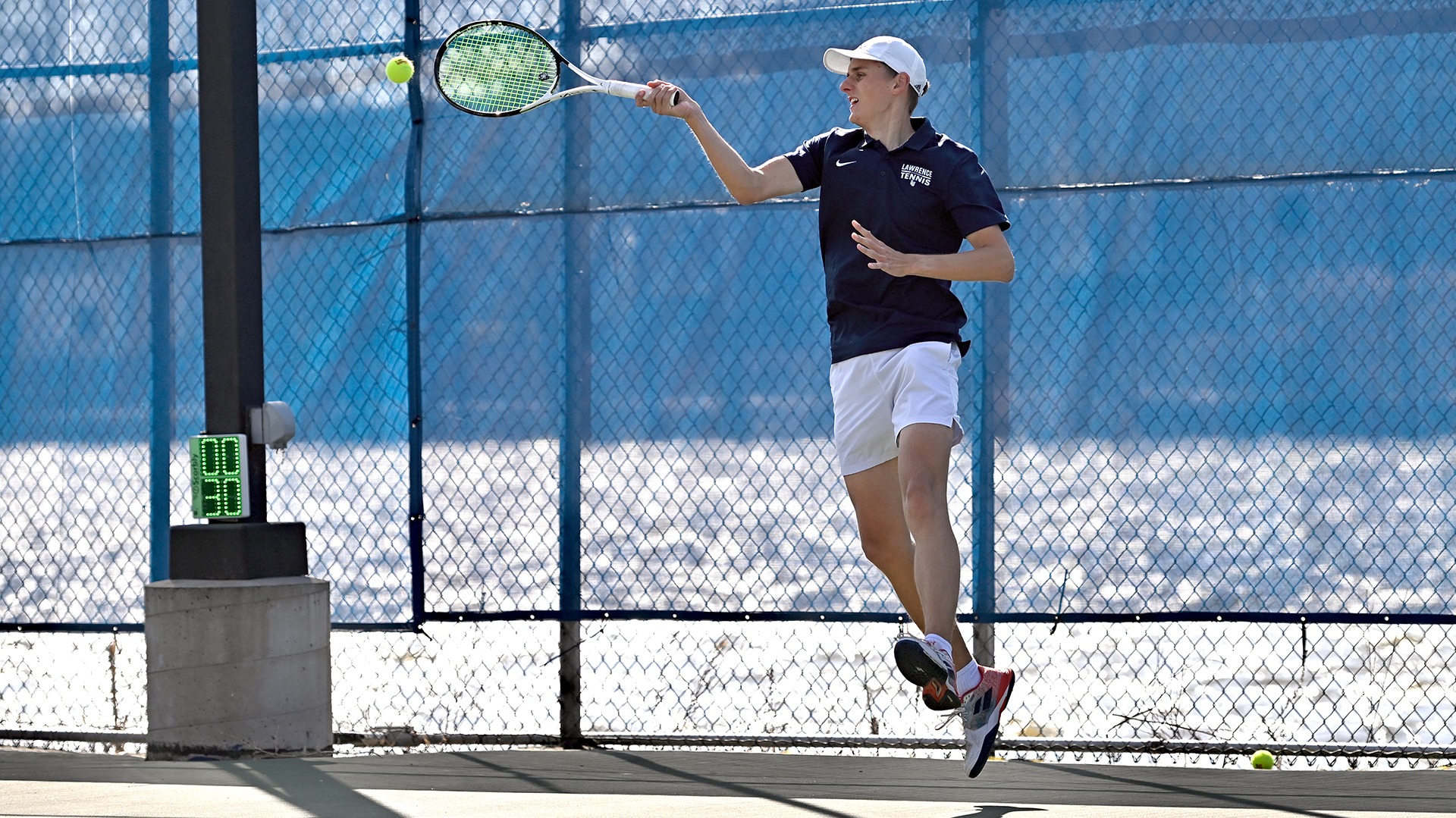 Lawrence men's tennis action Benjamin Hoppe