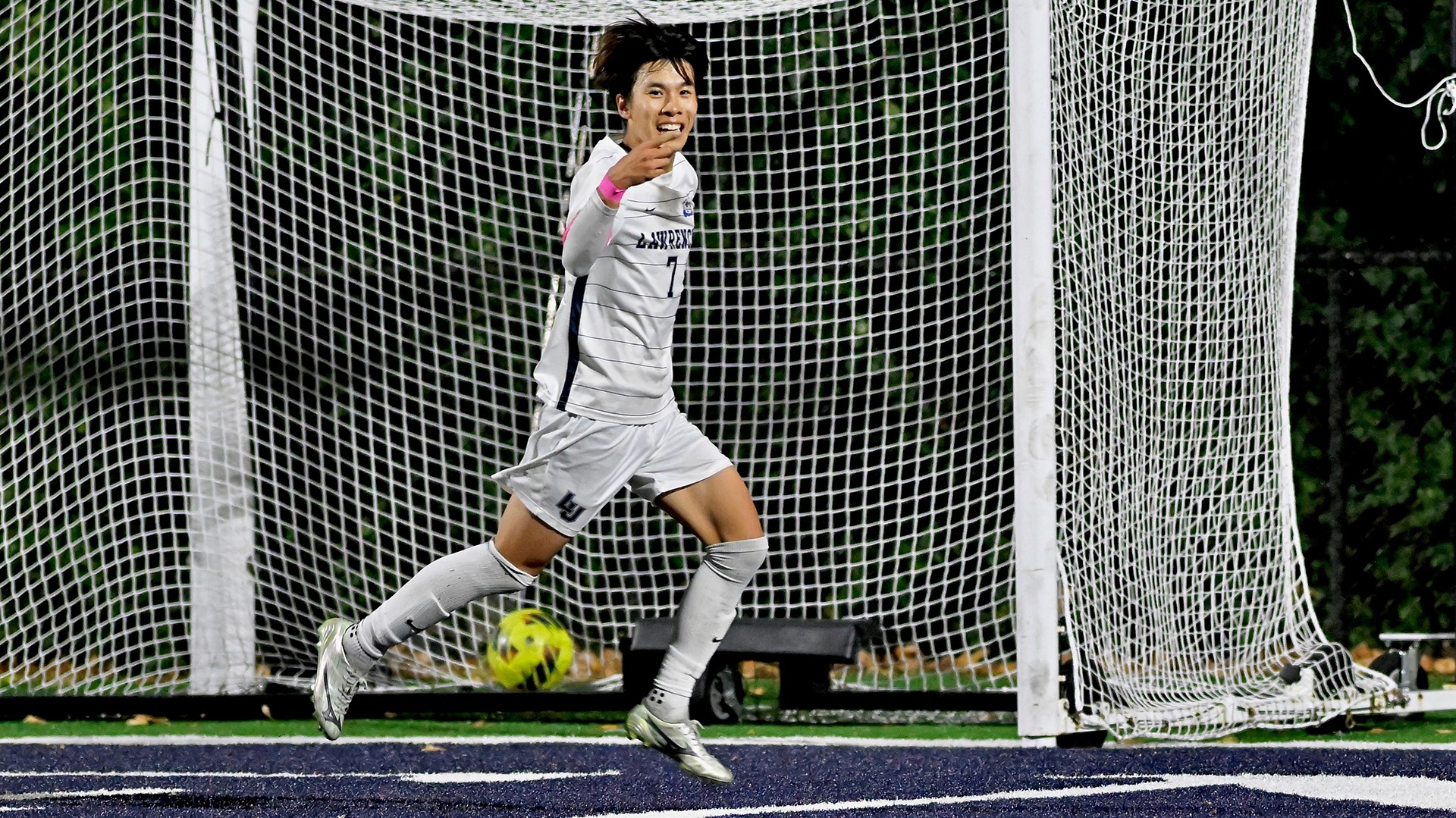 Lawrence men's soccer action Daito Sho