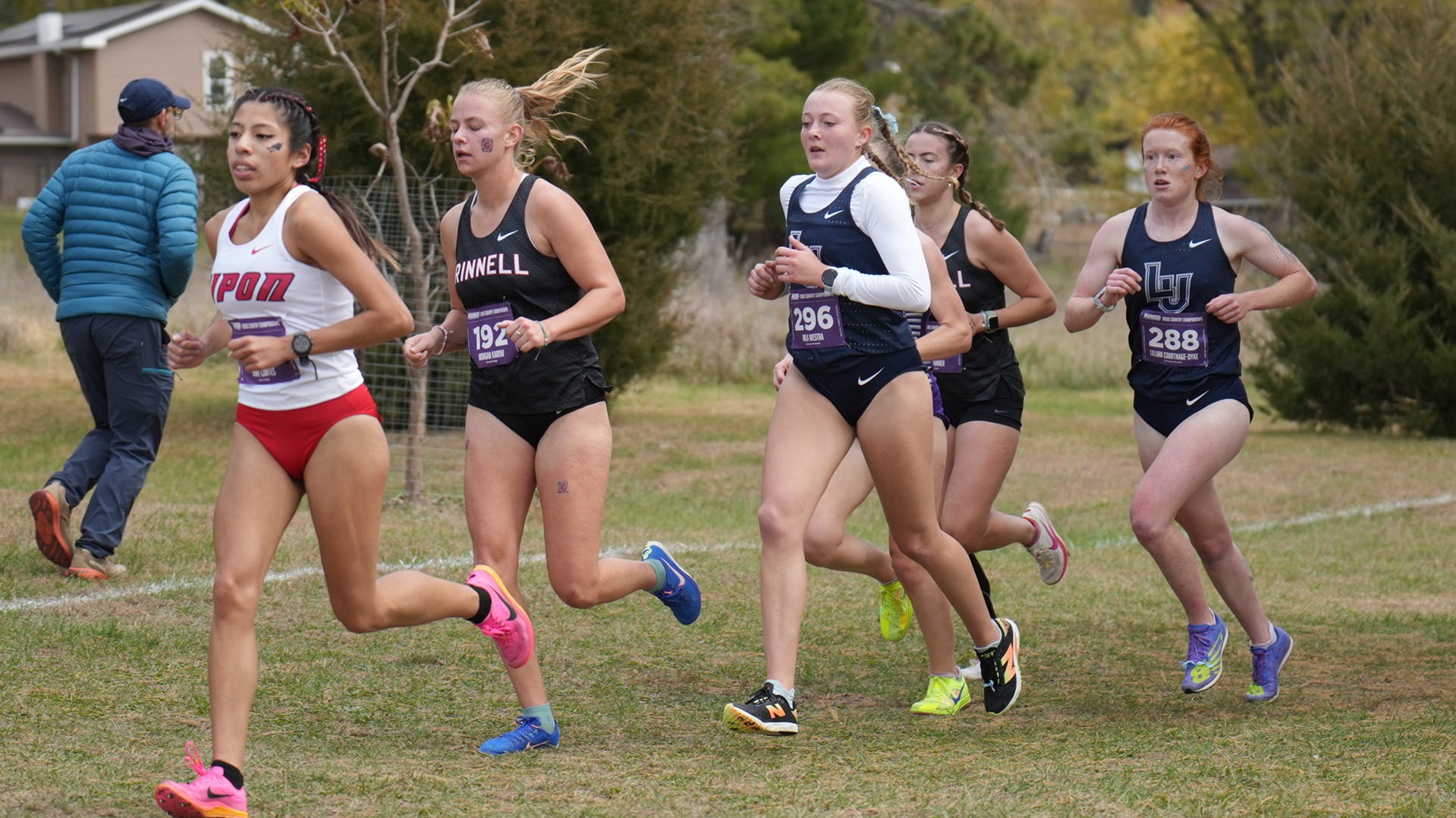 Lawrence women's xc action Mila Westra and Lillian Courtnage-Dyke