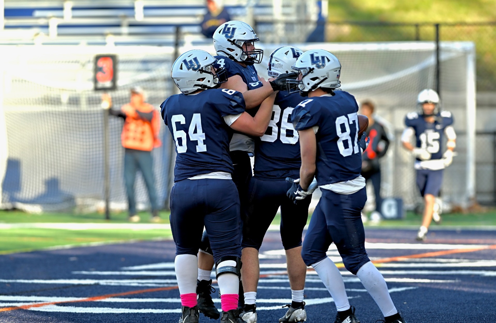 lawrence football group action shot 