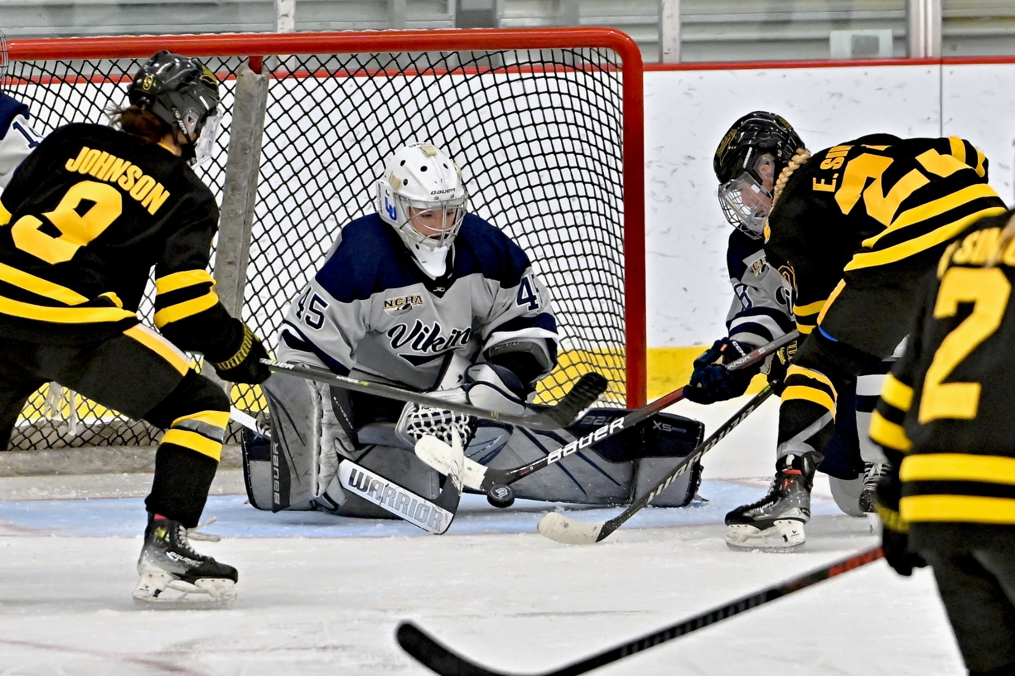 lawrence womens hockey action shot of ella sciborski 