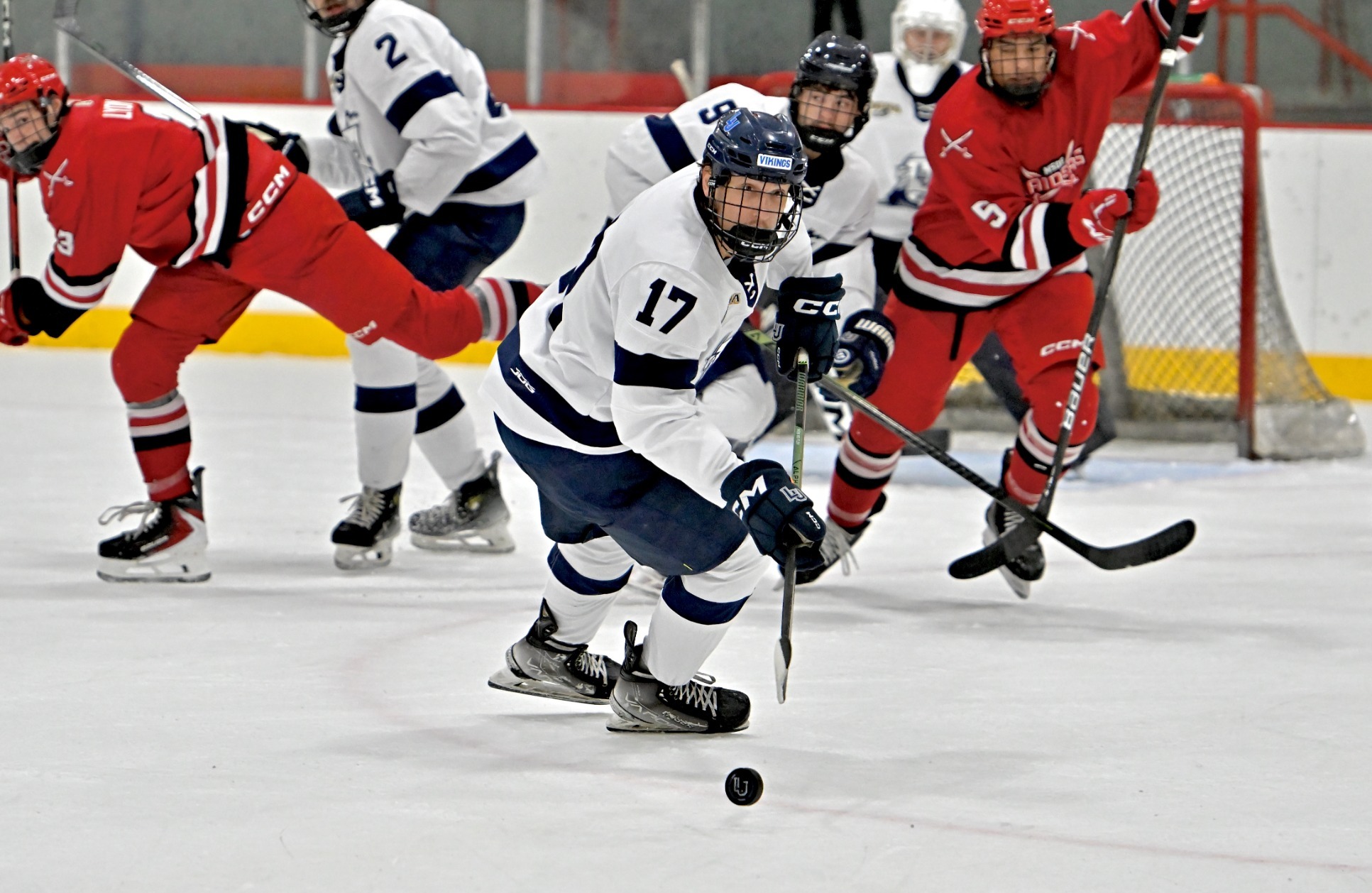 mens hockey action shot of robby pustulka 