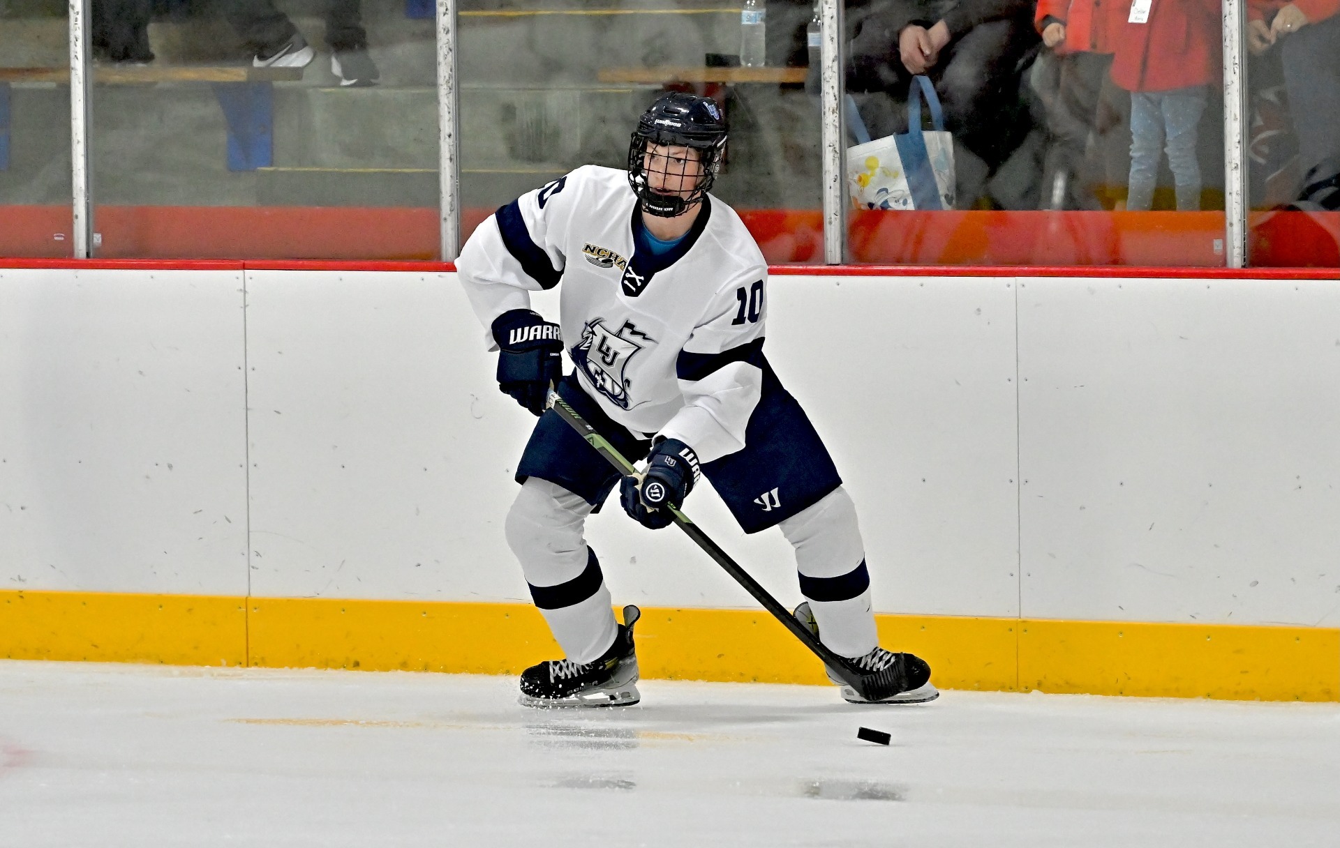 mens hockey action game shot of ethan johnson 