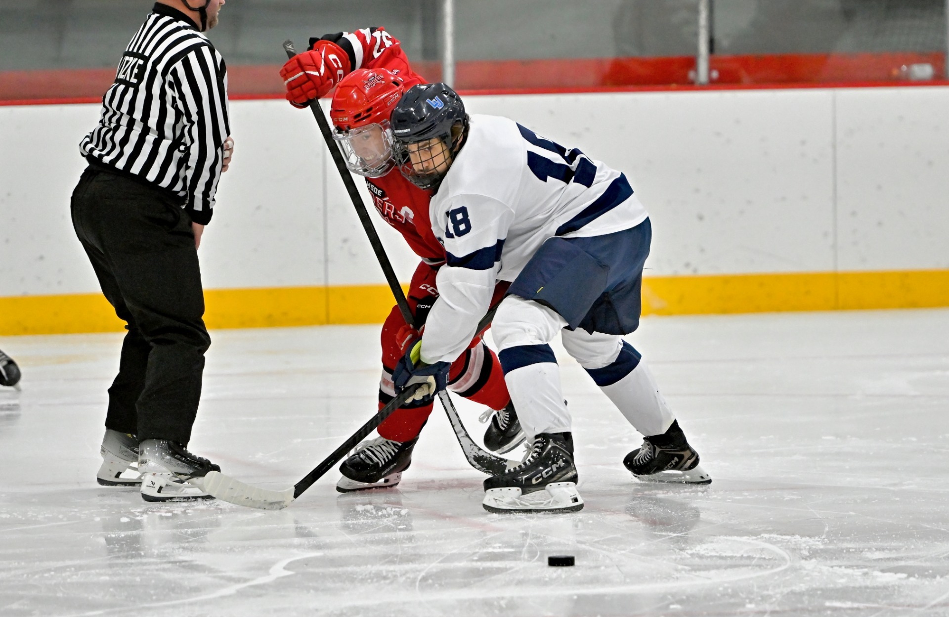 lawrence mens hockey action shot of ben winkelmann