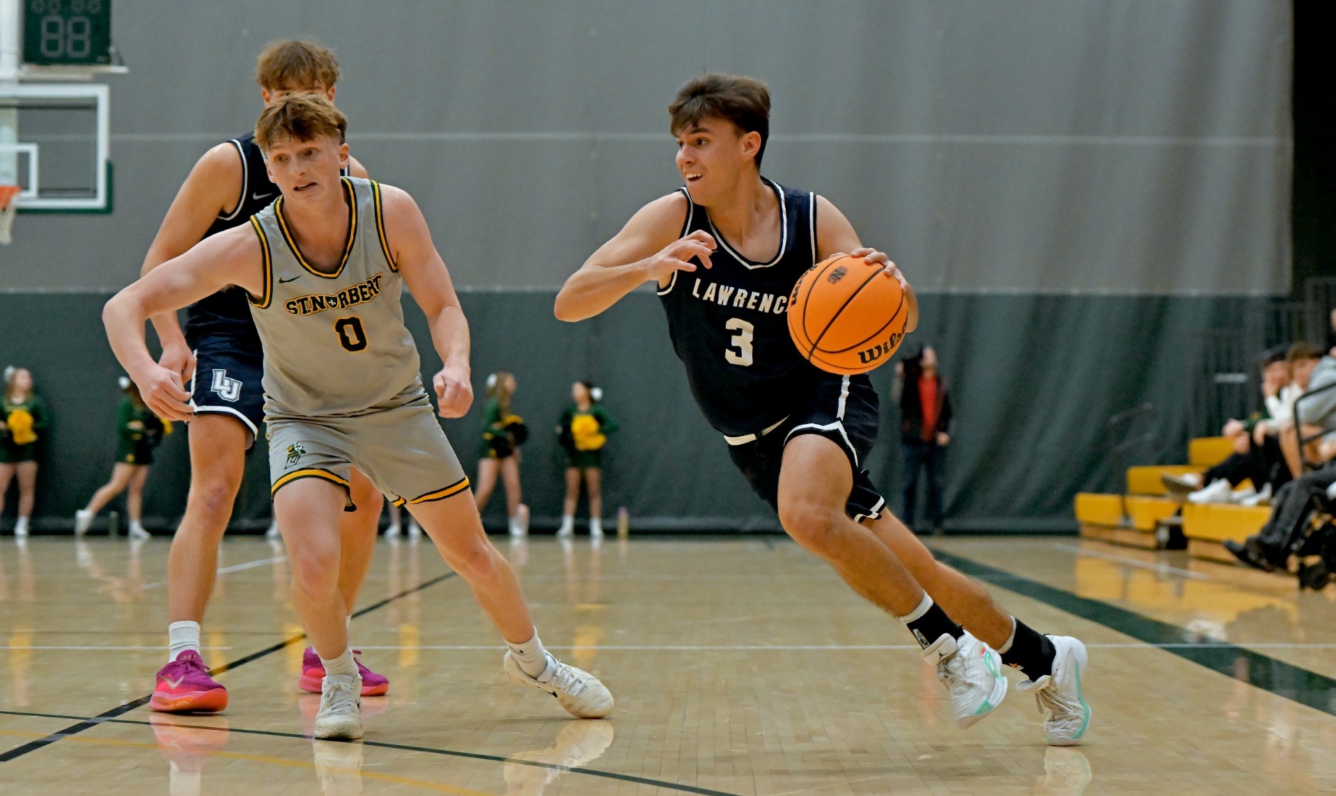 lawrence mens basketball nathan valentine action shot 