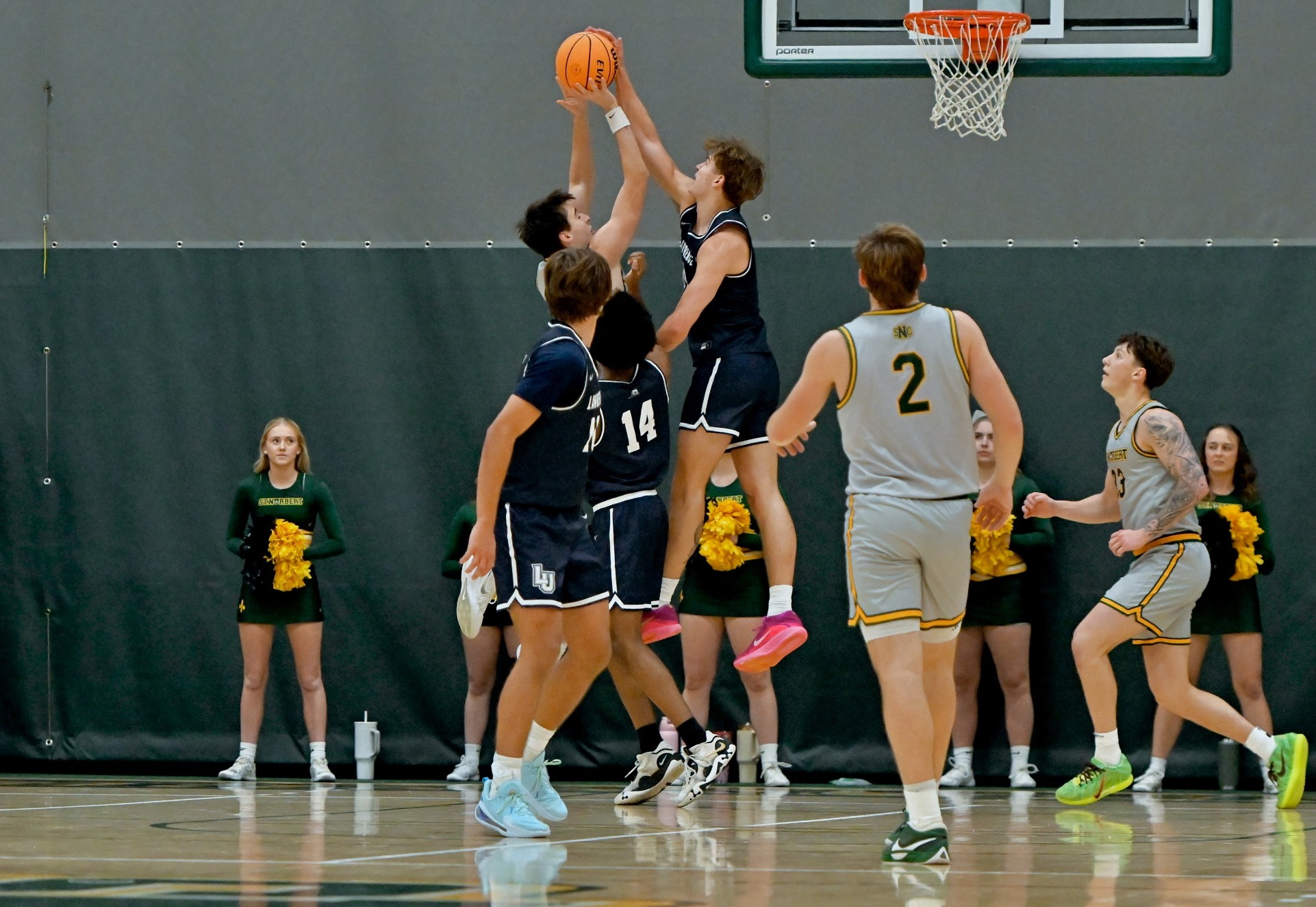mbb action shot of casey, hogan, and landon