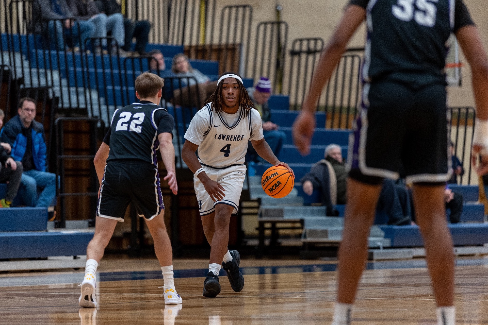 lu mens basketball action shot of caleb Nash 