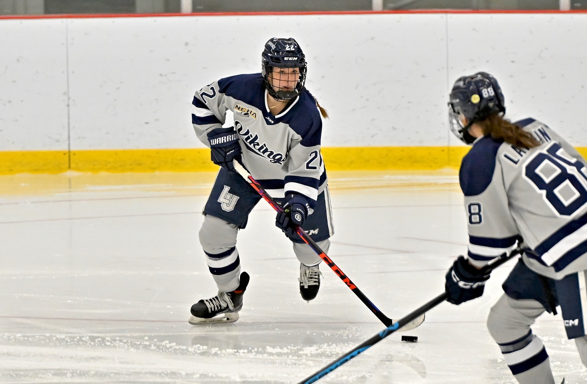 action shot of womens hockey teresa topolski