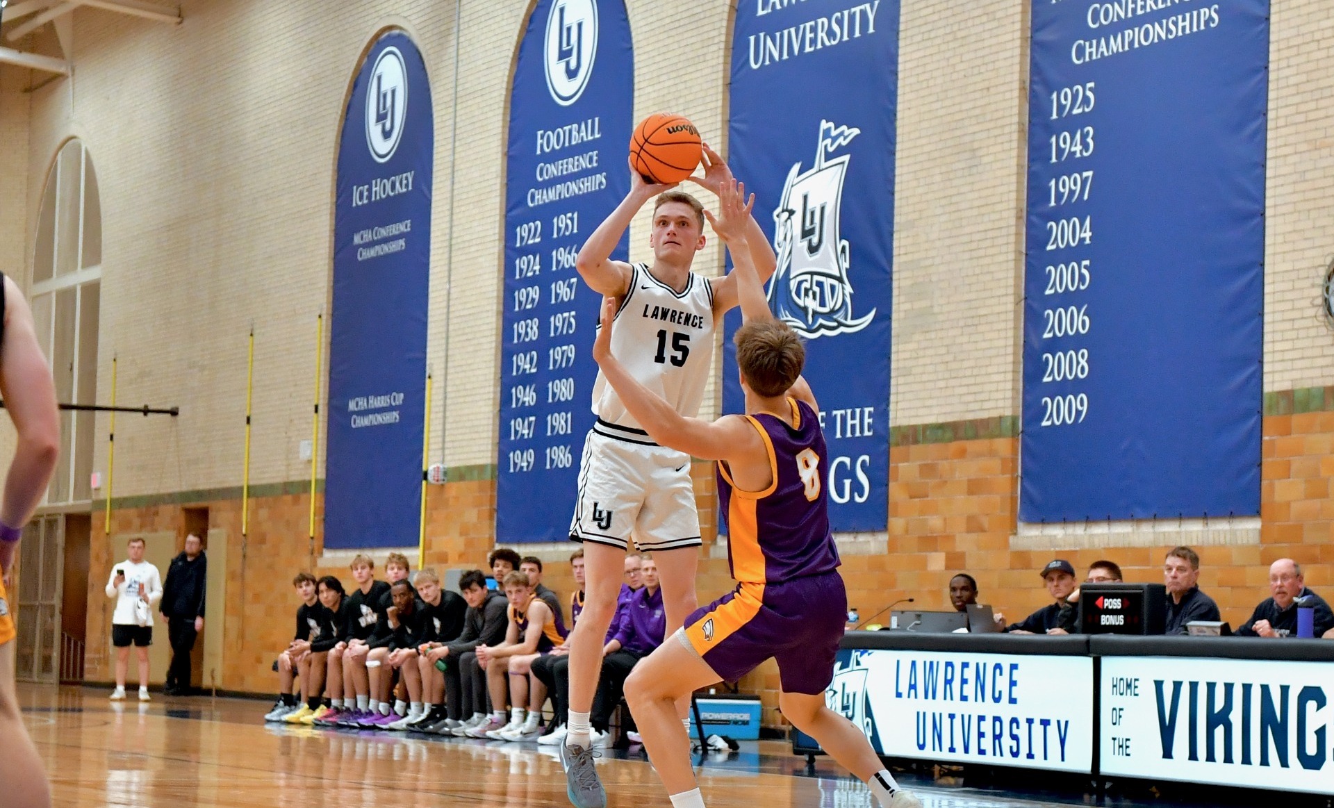 action shot of cj campbell from mens basketball 