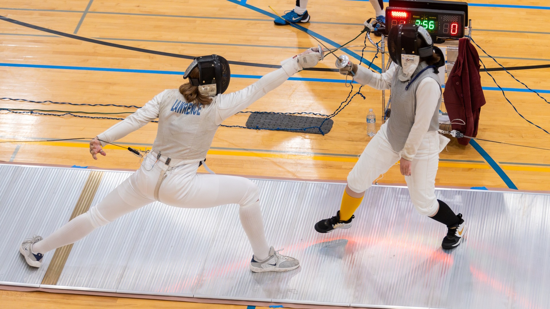 Lawrence women's fencing action