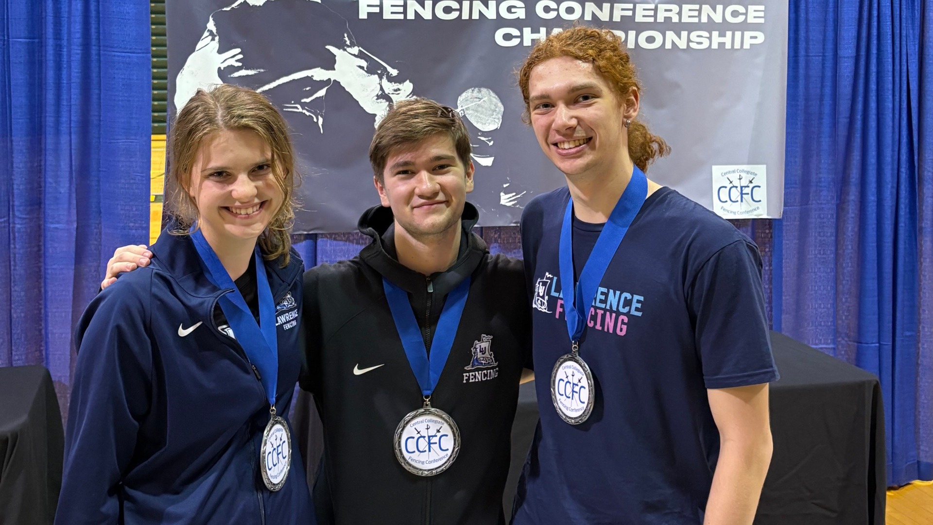 Lawrence fencers Jayna Davis, Eli Freyre de Andrade and Jack Kropp at CCFC Championships
