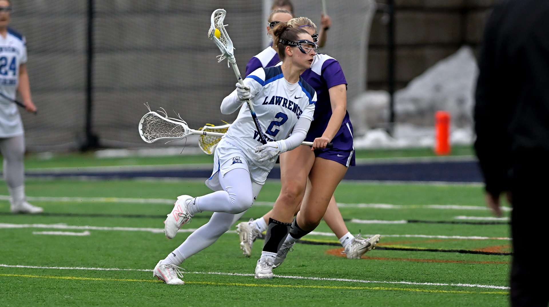 Lawrence women's lacrosse action Lydia Lueck
