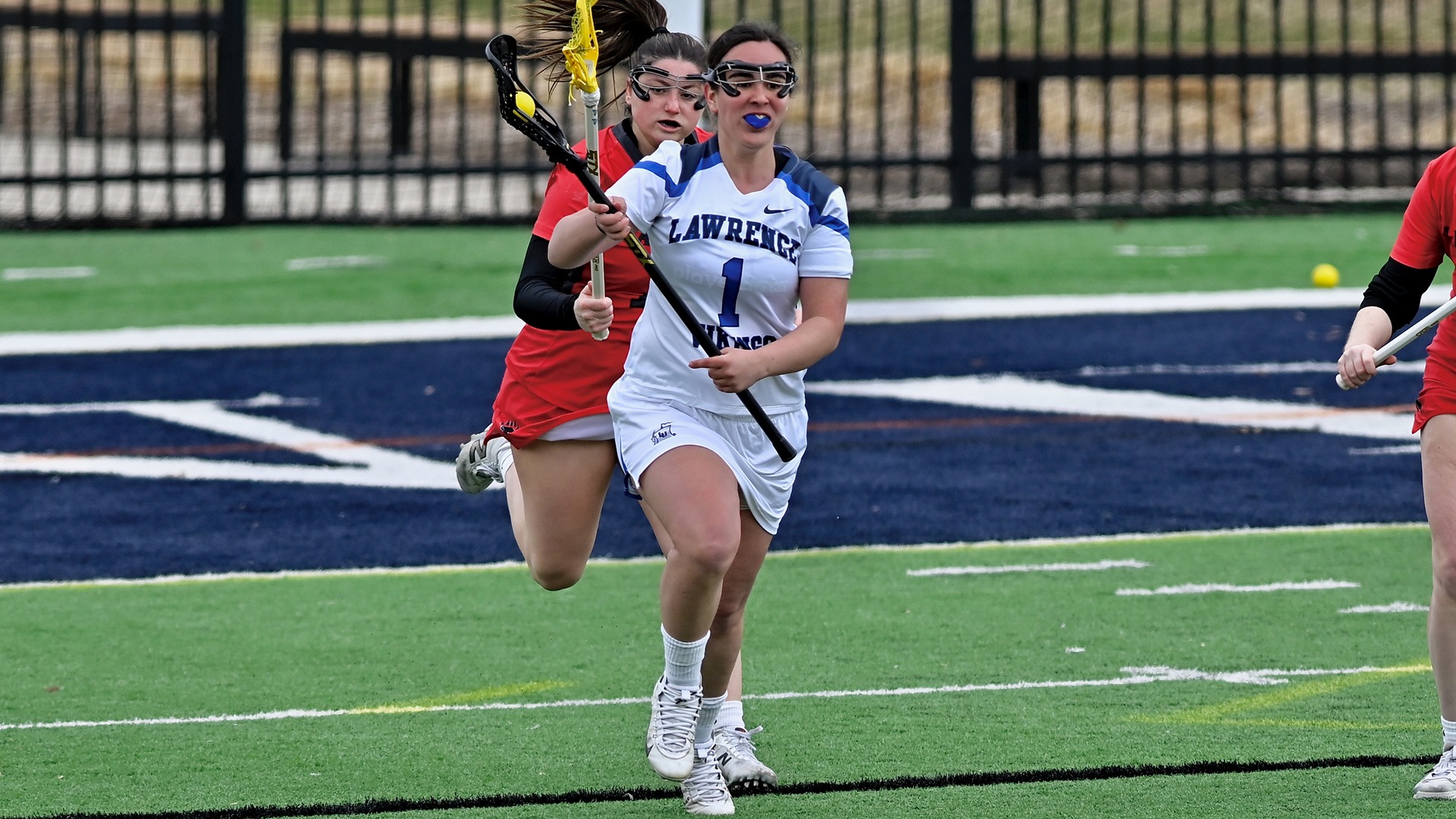Lawrence women's lacrosse action Savannah Larsen