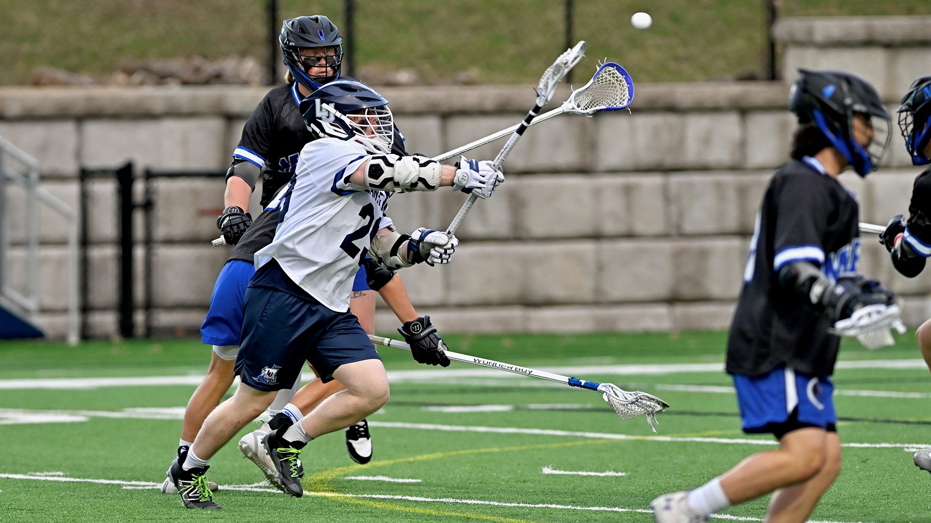 Lawrence men's lacrosse action Brody Herr