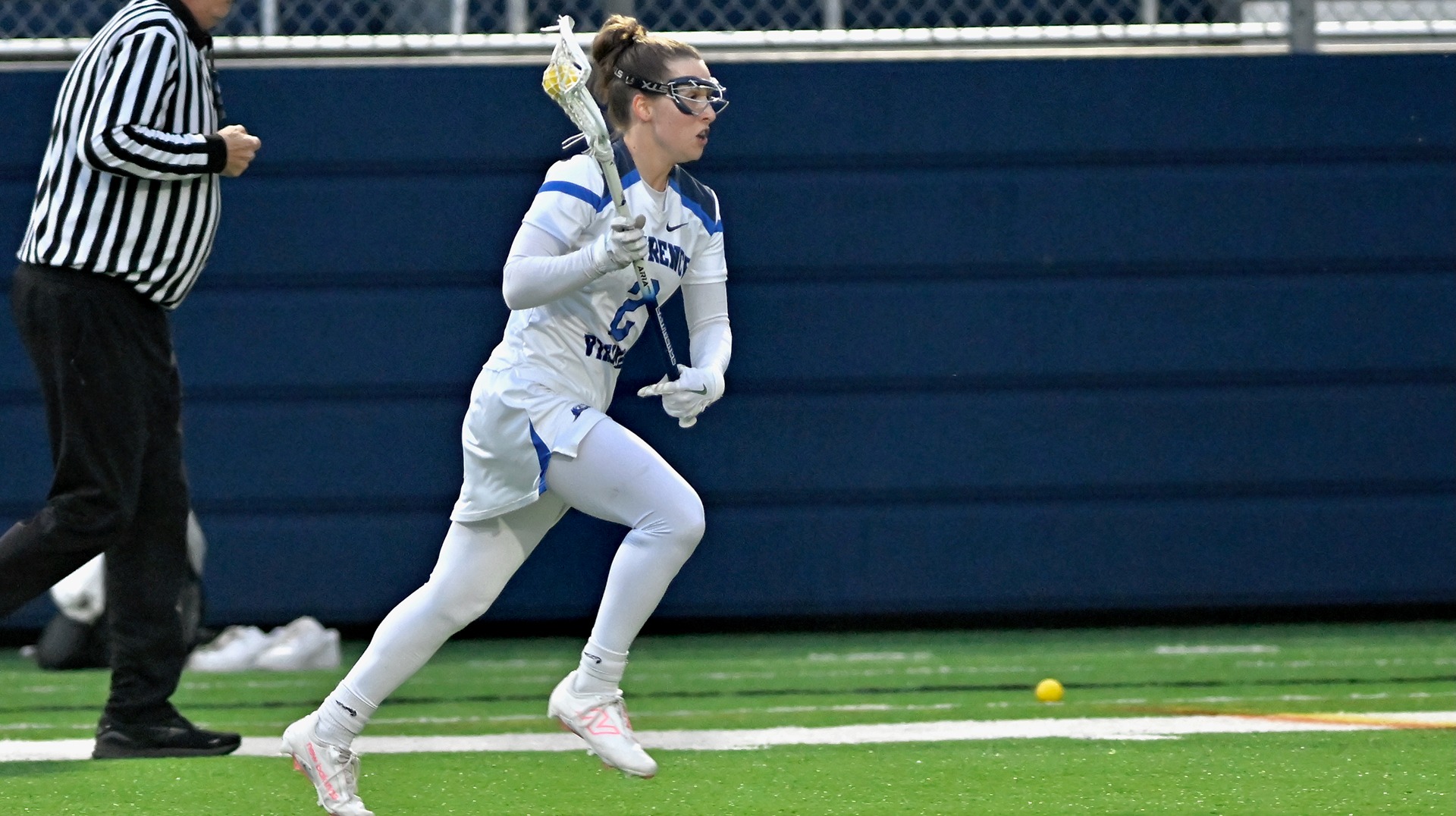Lawrence women's lacrosse action Lydia Lueck
