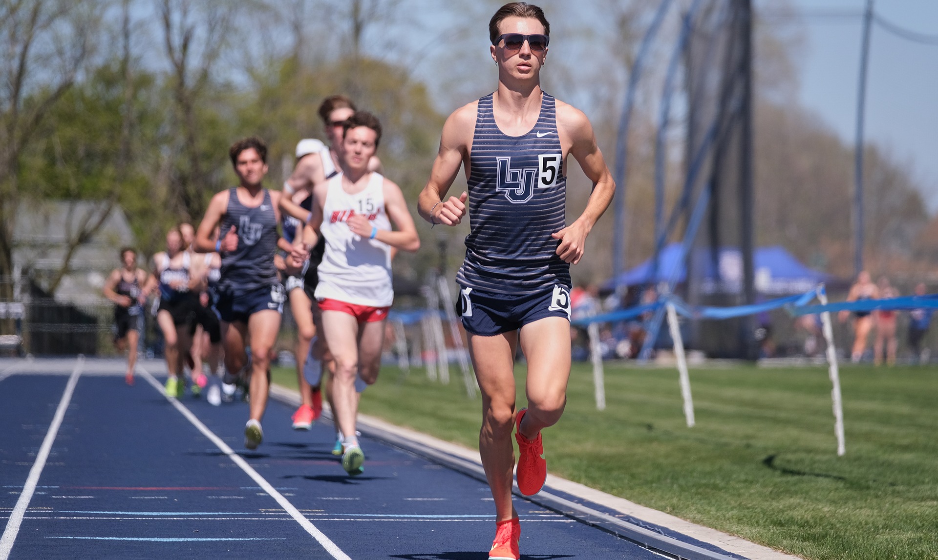 Lawrence men's track action Finn Lee
