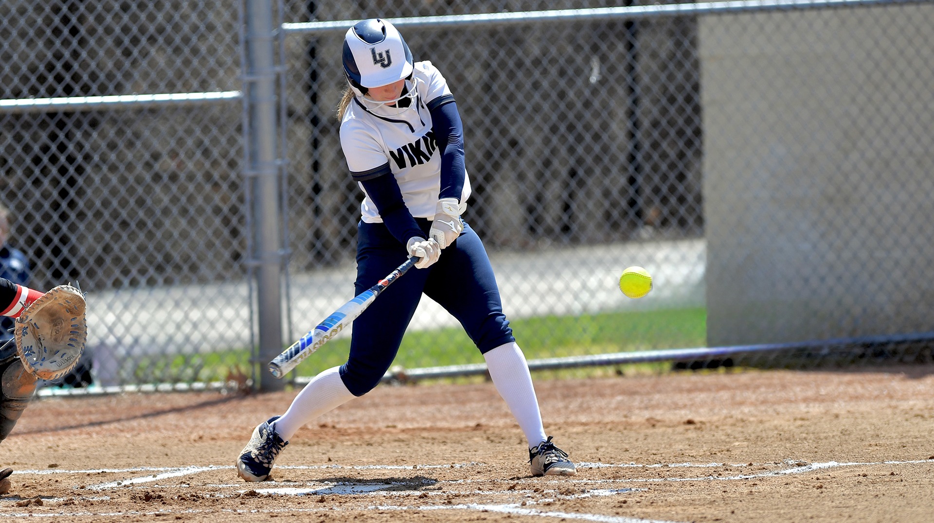 Lawrence softball action Mattigan Haller