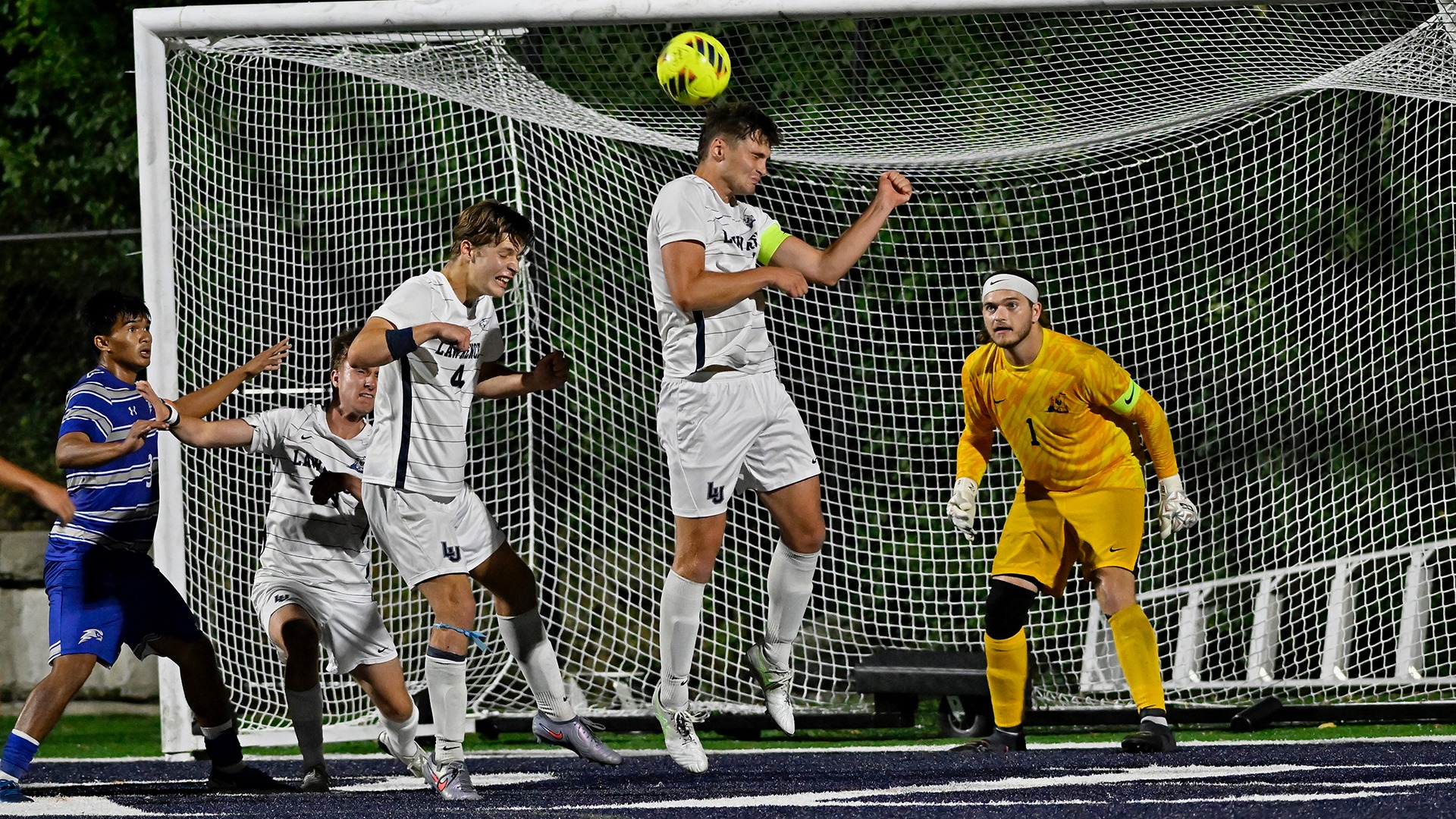 Lawrence men's soccer action Eamon Rougvie