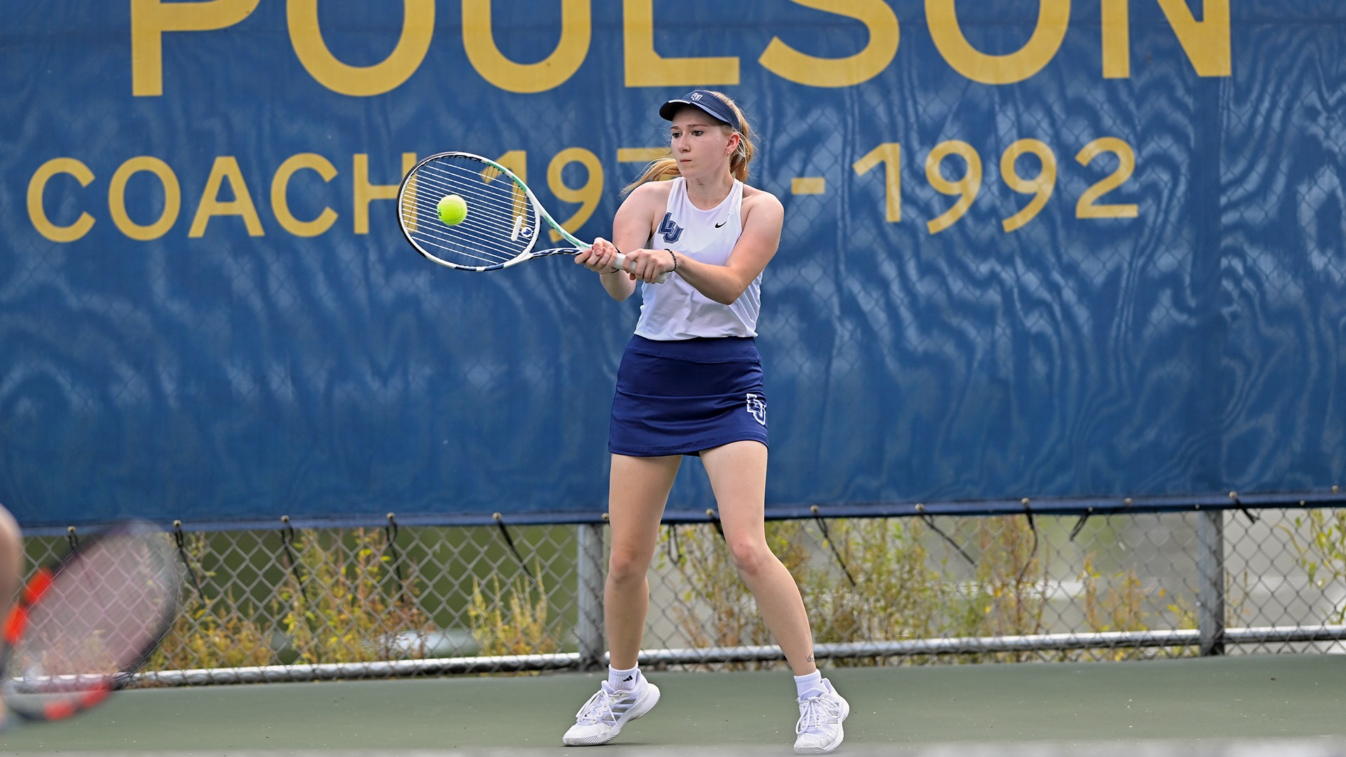 Lawrence women's tennis action Rachael Pofahl