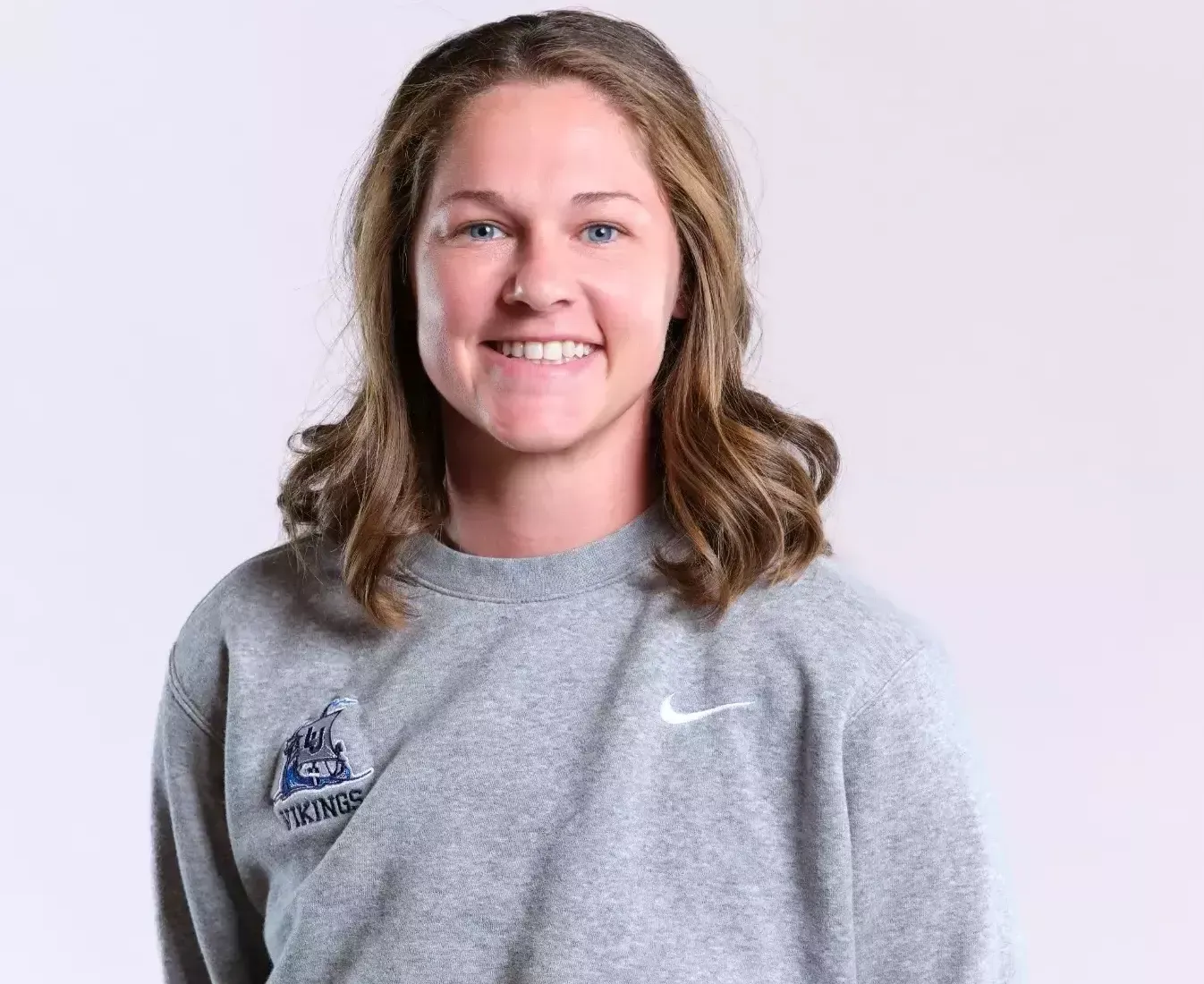posing for team headshot 