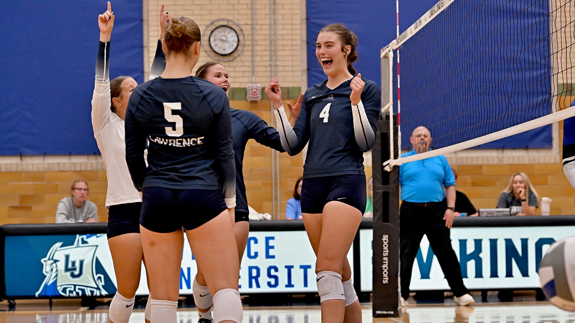 Lawrence volleyball action Audrey Weier