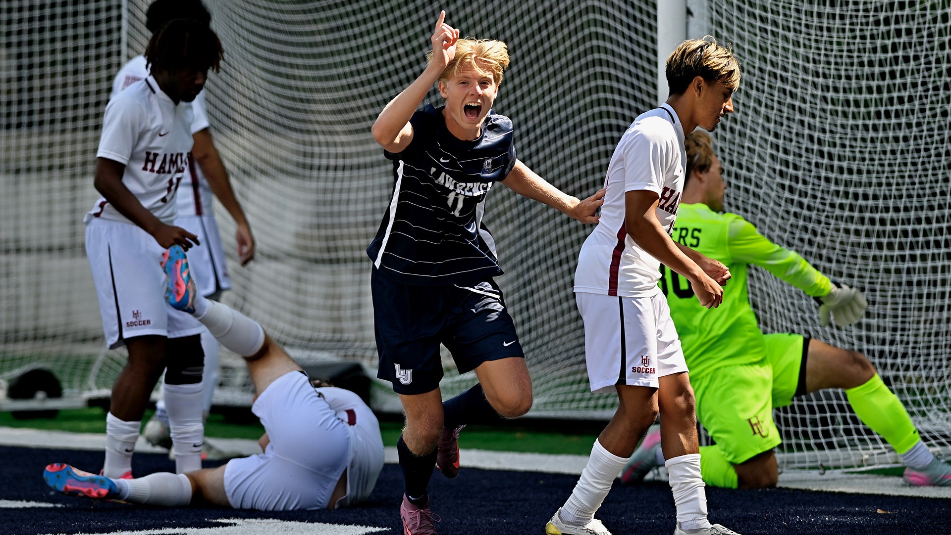 Lawrence men's soccer action William Mikkelsen