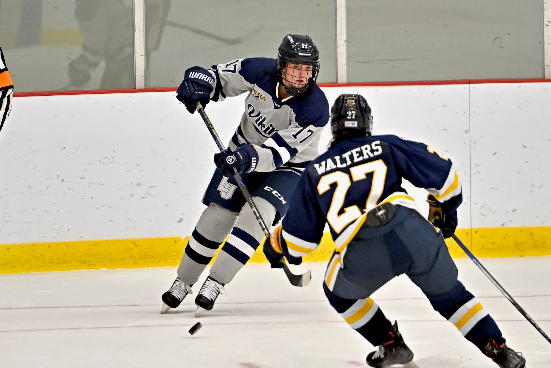 women hockey action shot of Ashley Slupe 