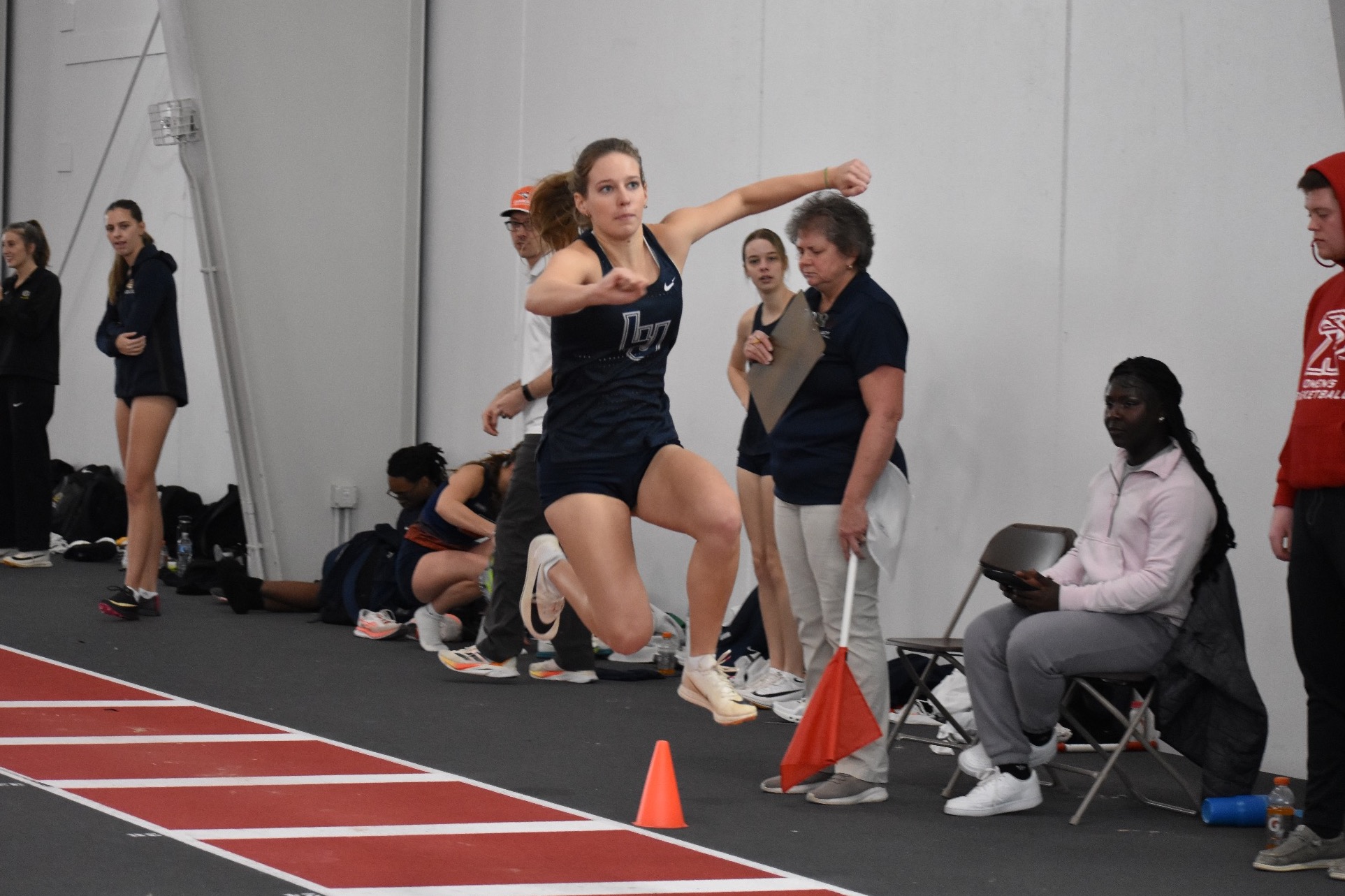 action shot of Anna vandenacker from womens track