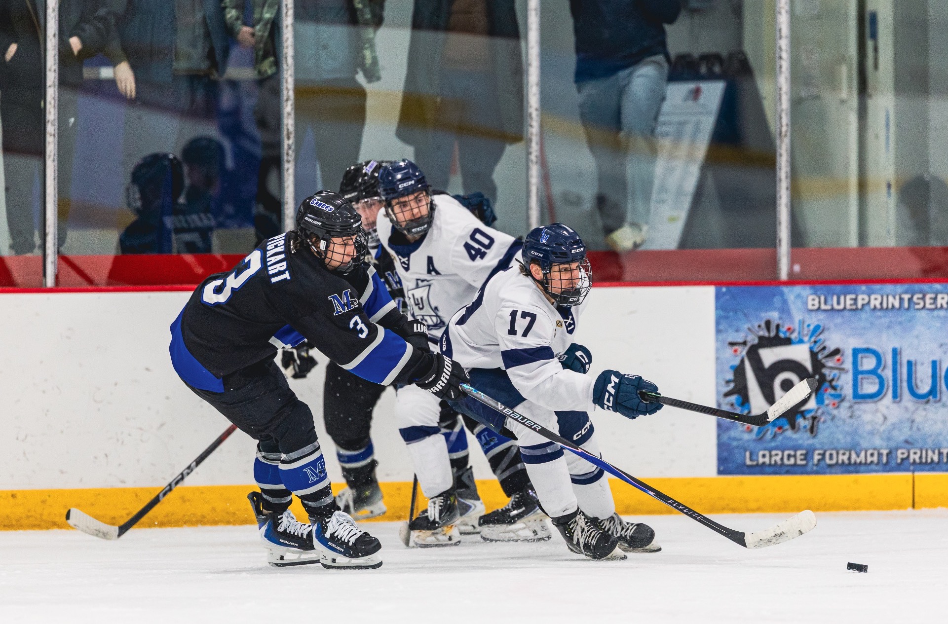 mens hockey group action shot 
