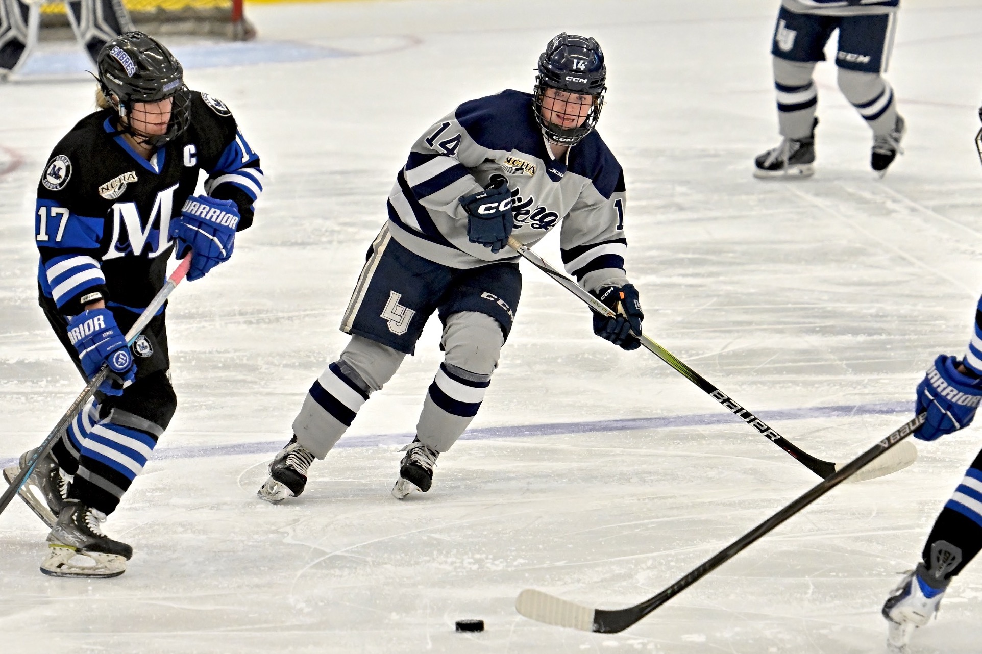 lu womens hockey action shot of Josie 
