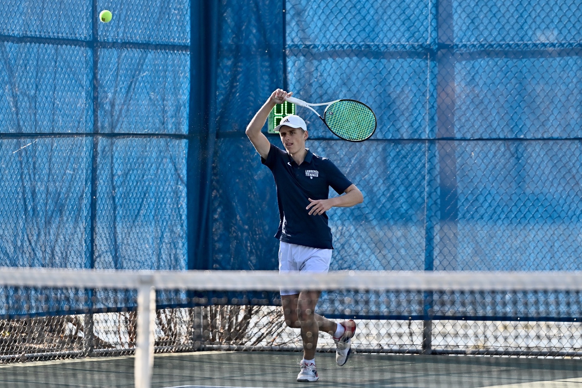 action shot of men tennis ben Hoppe 
