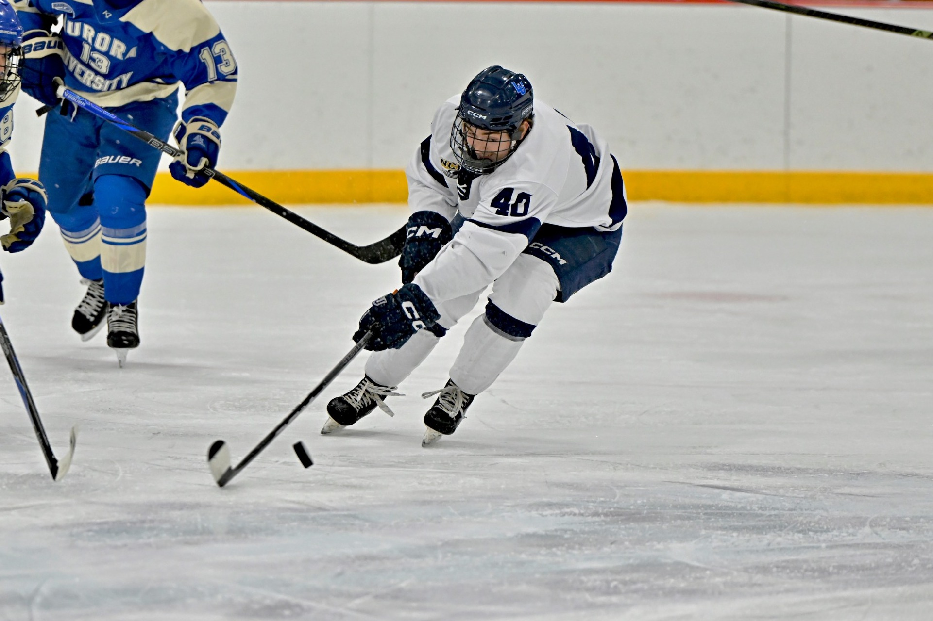 action shot of cody brekke from mens hockey 