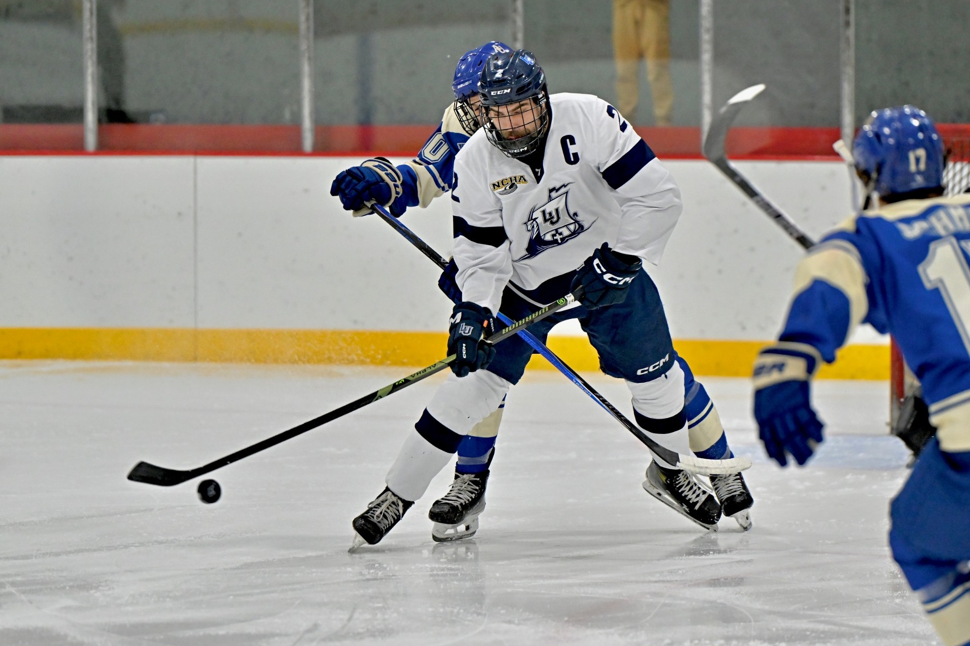 action shot of jayden jensen from mens hockey 