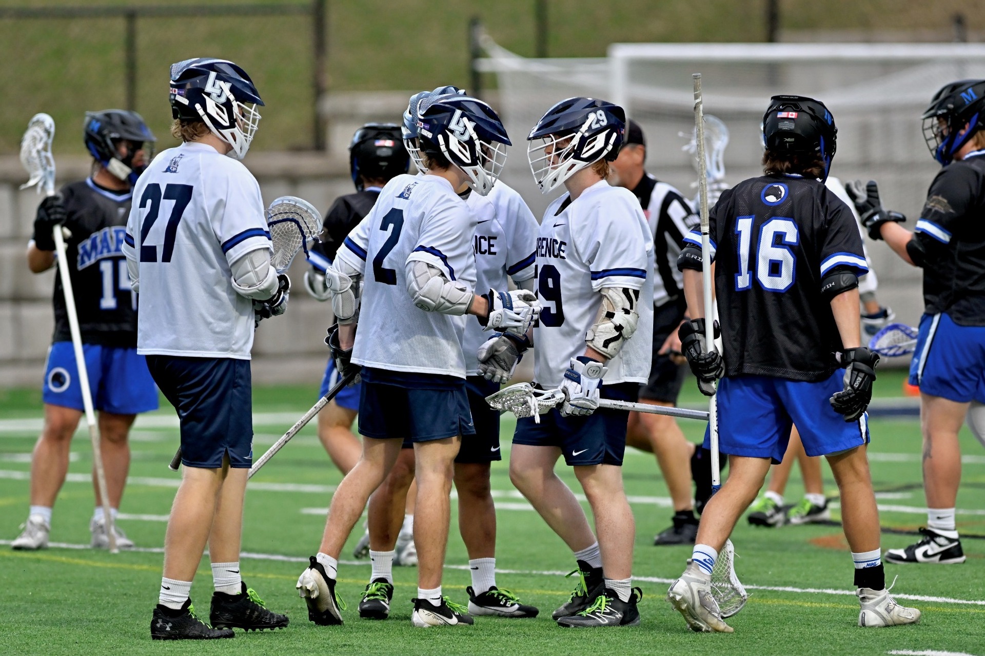 action shot of mens lacrosse brody herr 