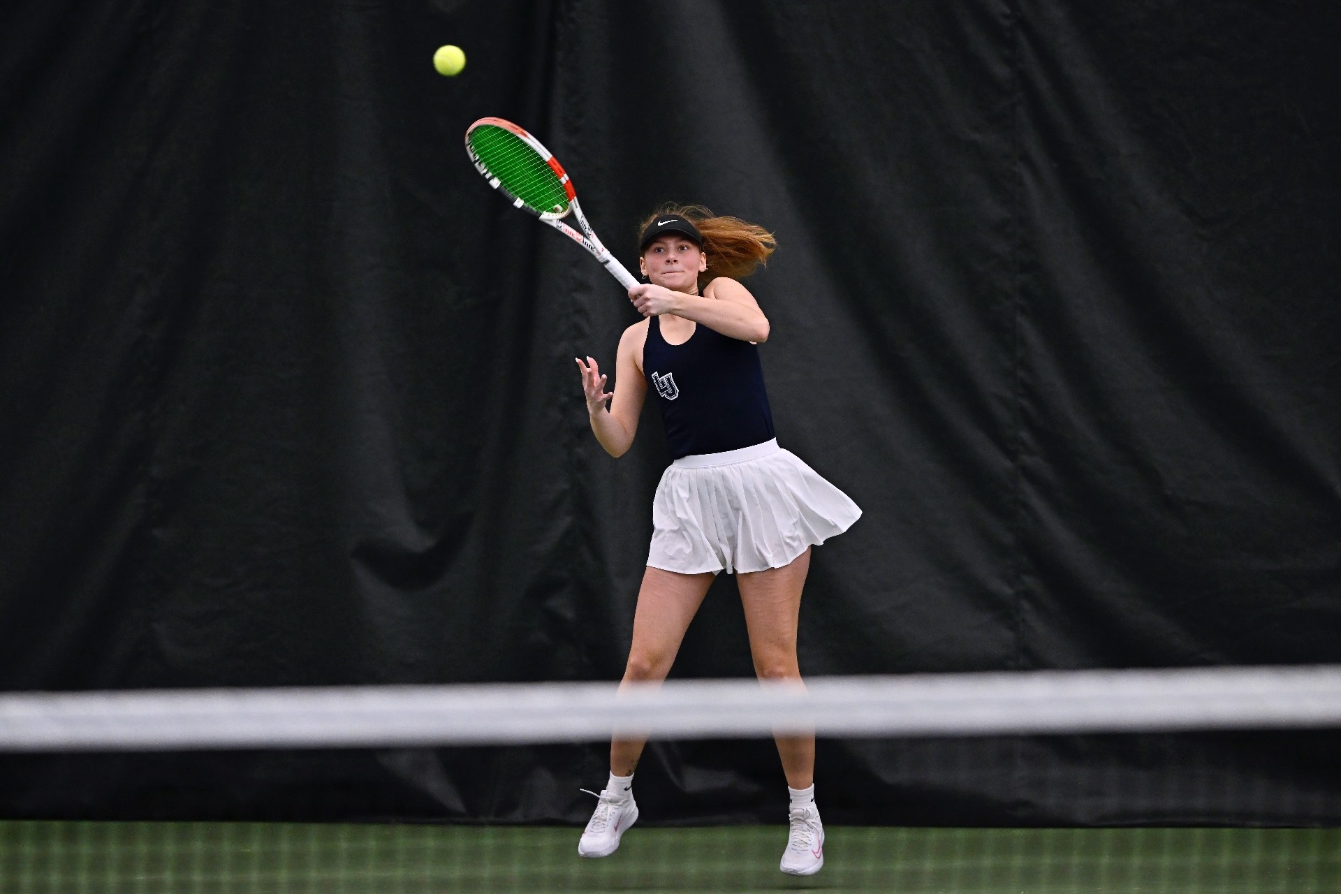 hill action shot from womens tennis 