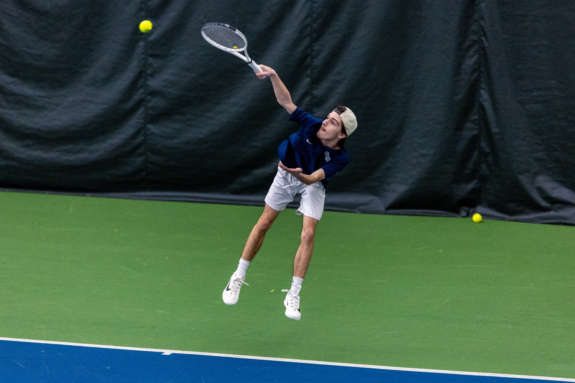action shot of mens tennis 