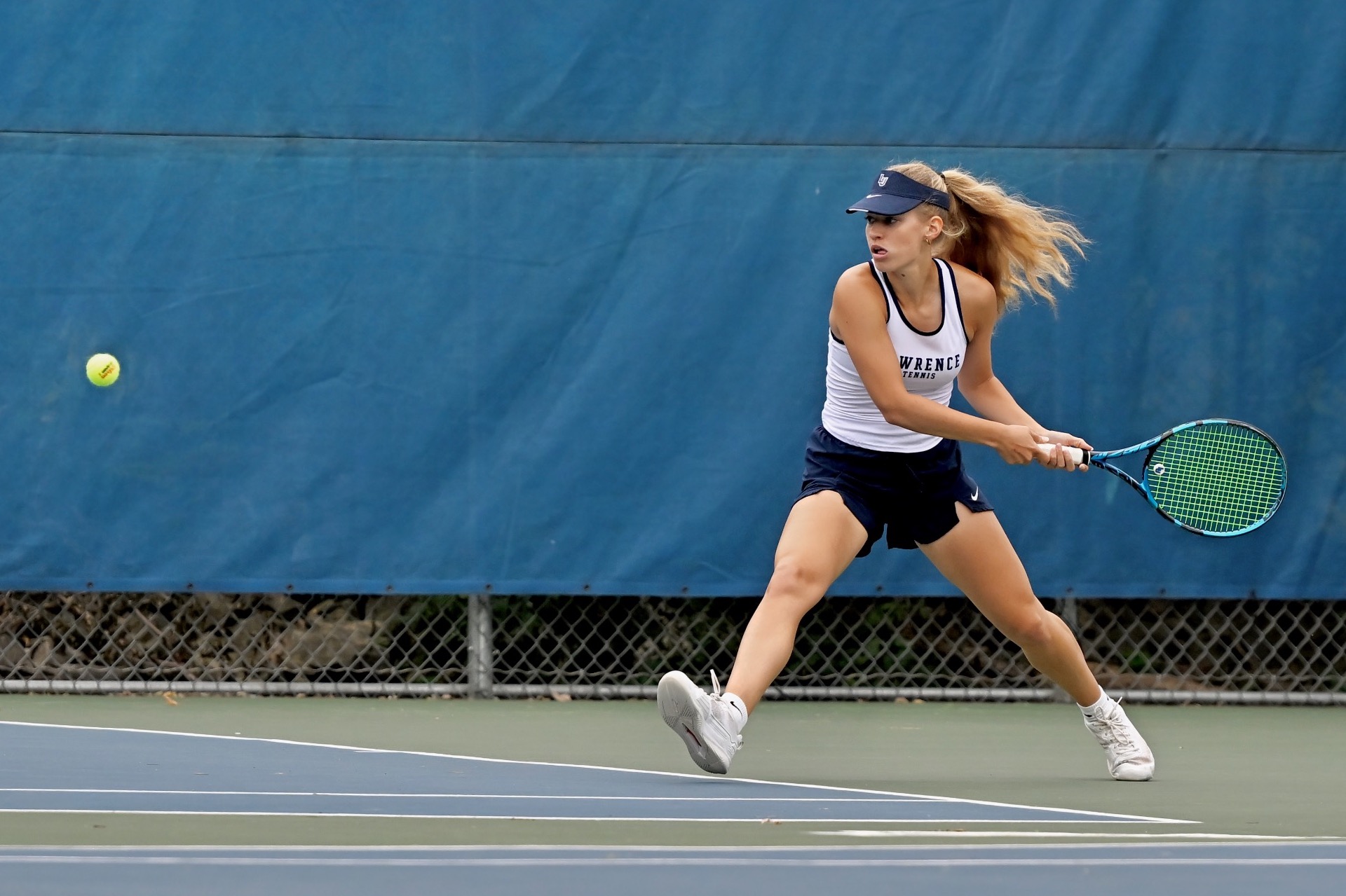 Anna Vanden Acker womens tennis action shot 