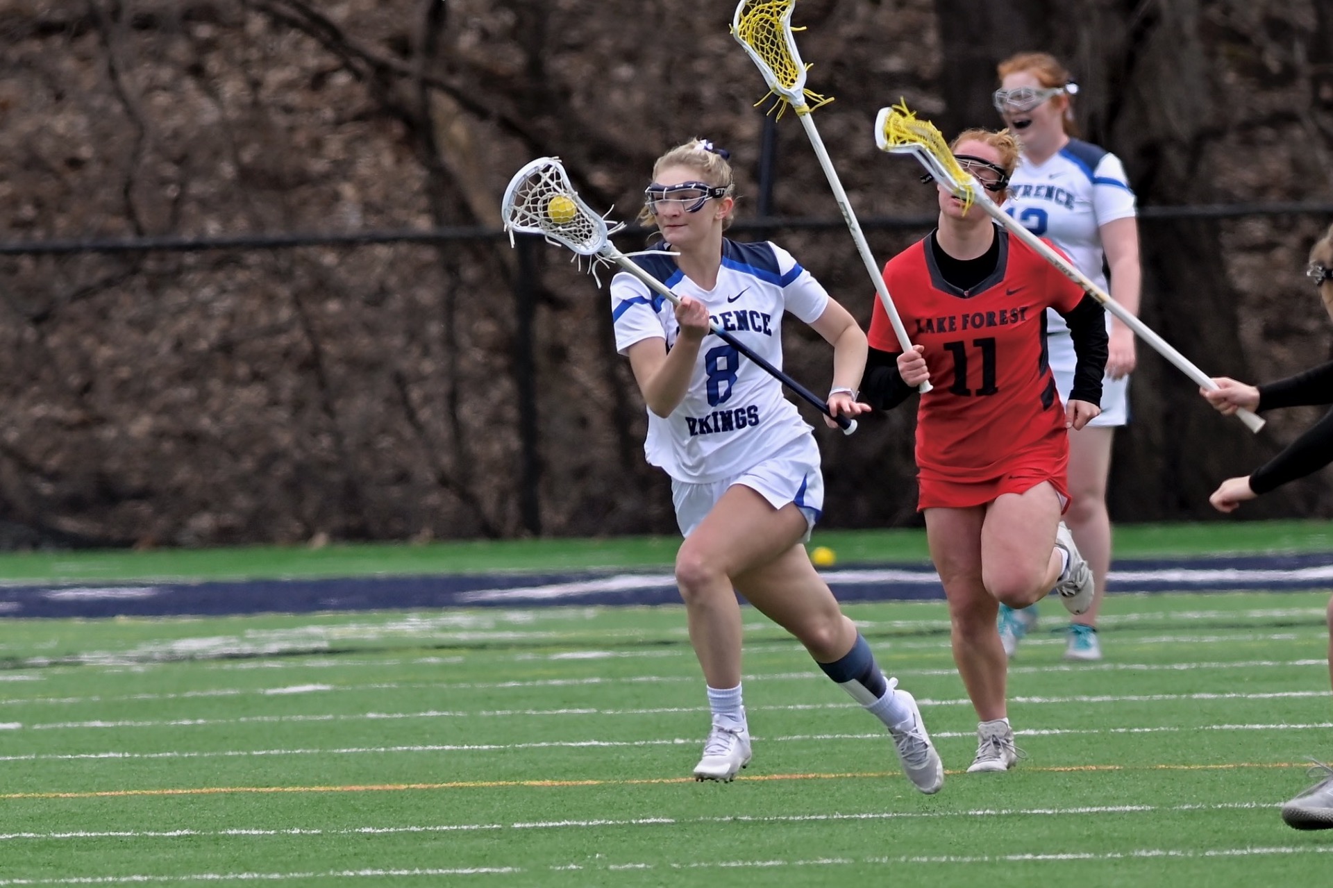 Emma Perry action shot form womens lacrosse 