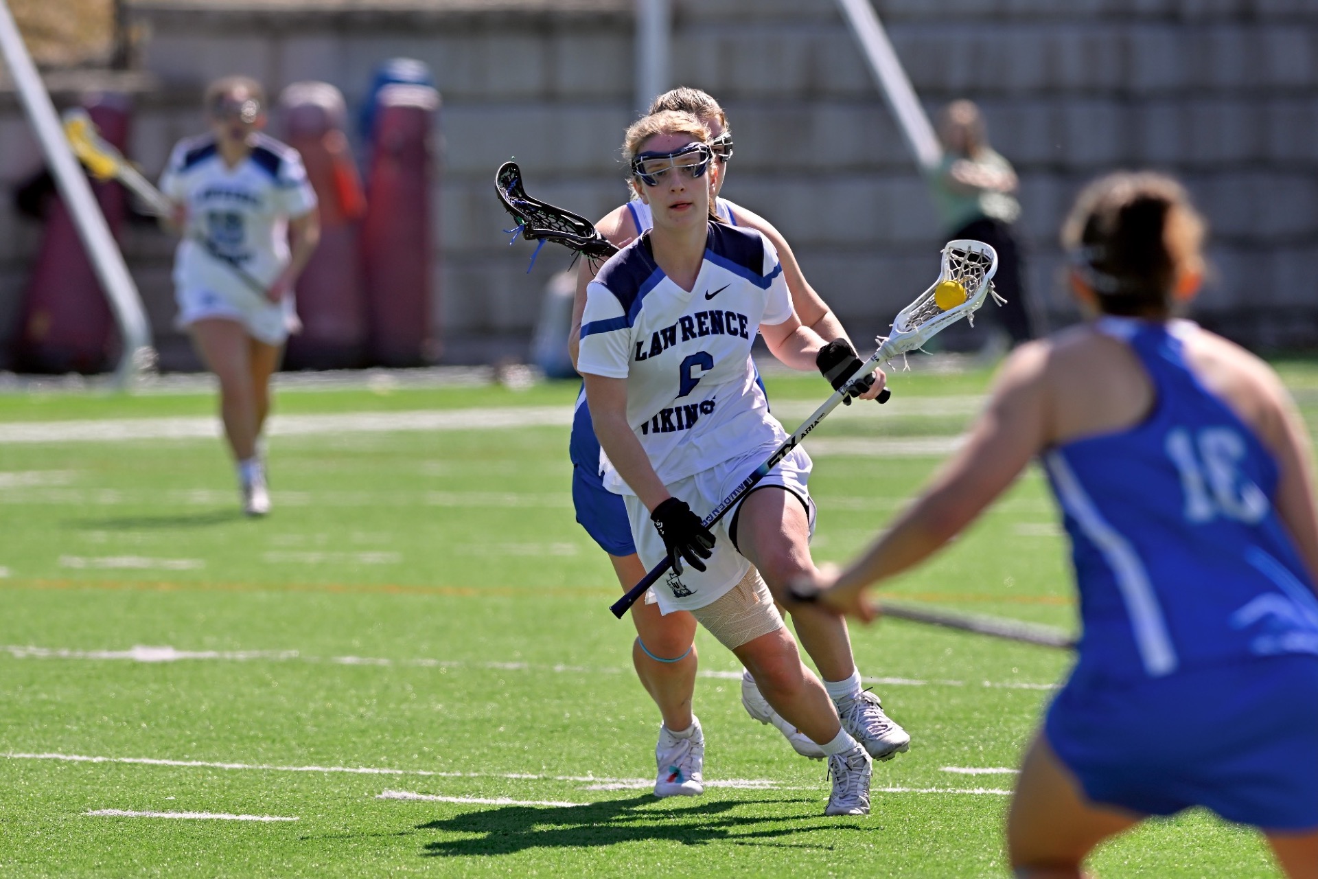 Sarah action shot form women's lacrosse 