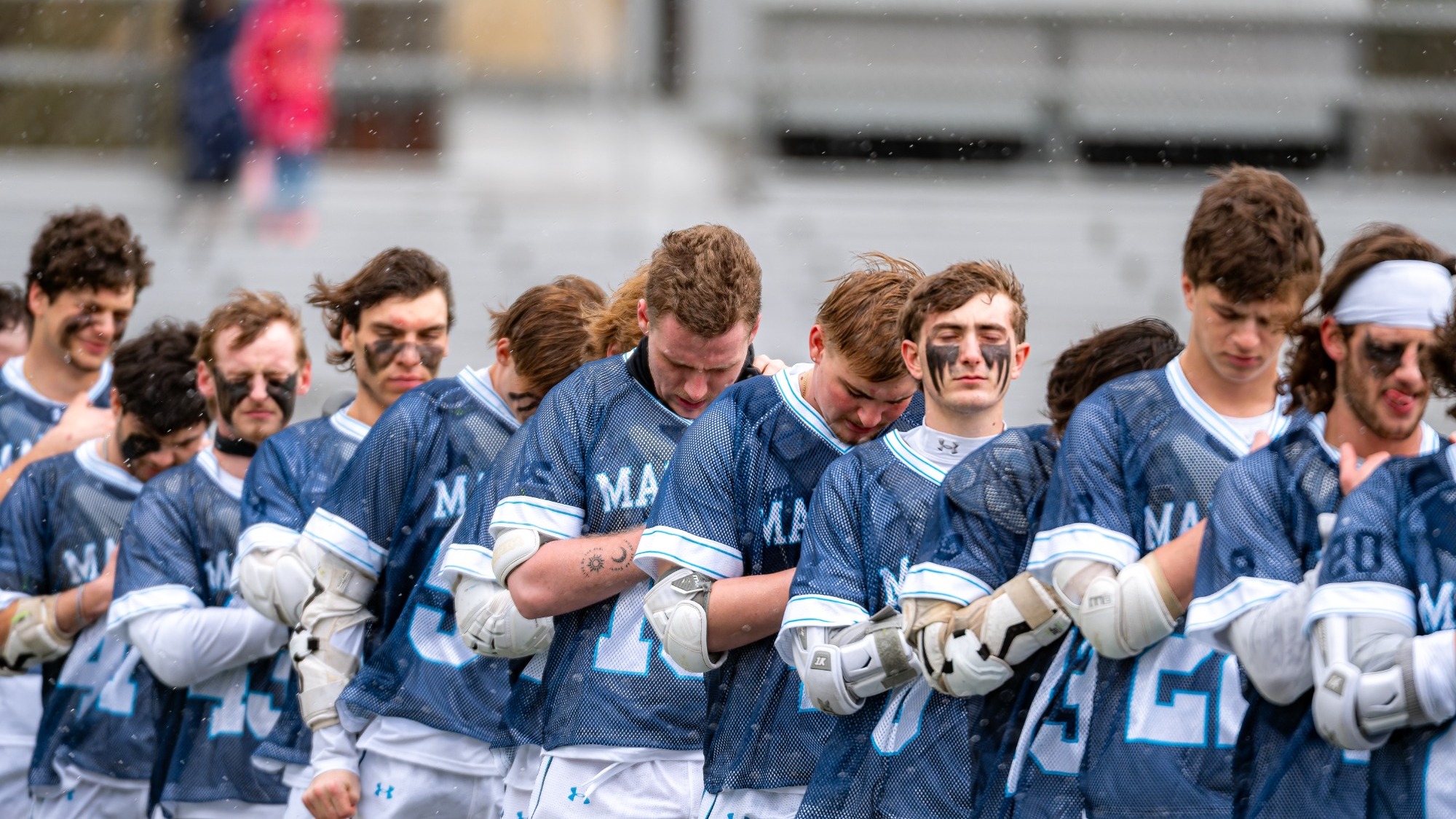 mlax team salute photo