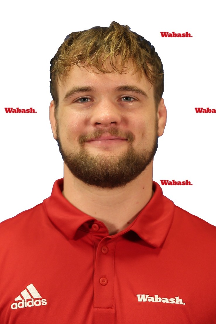 Coach Riley Kauzlaric