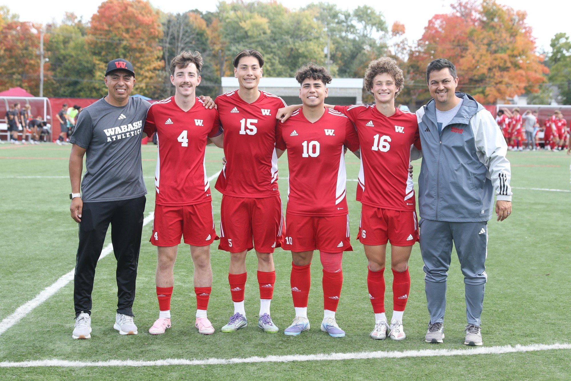 The senior members of the 2025 Wabash College soccer team with their coaches.