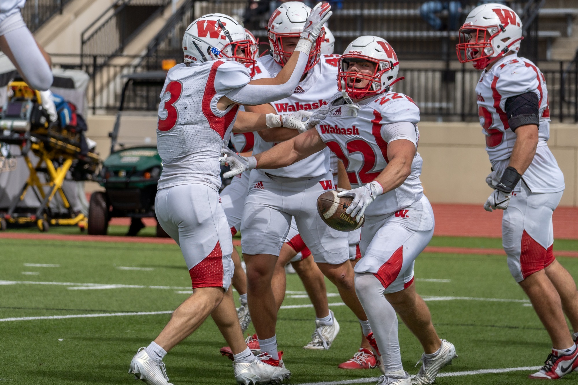 Gage Gulley celebrates a defensive play against St. Norbert