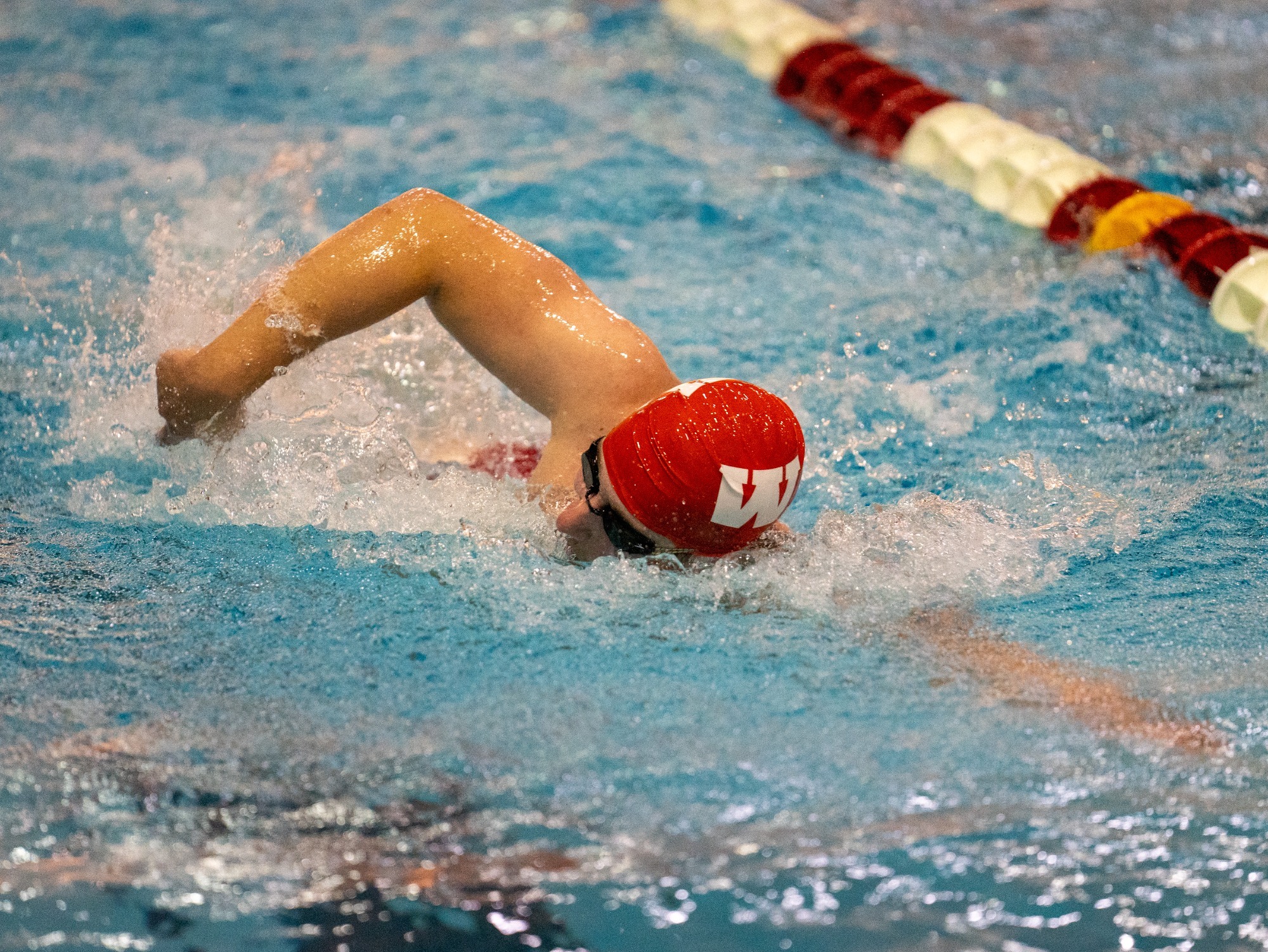 A Wabash swimmer competes at a home meet early in the 2025-2026 season