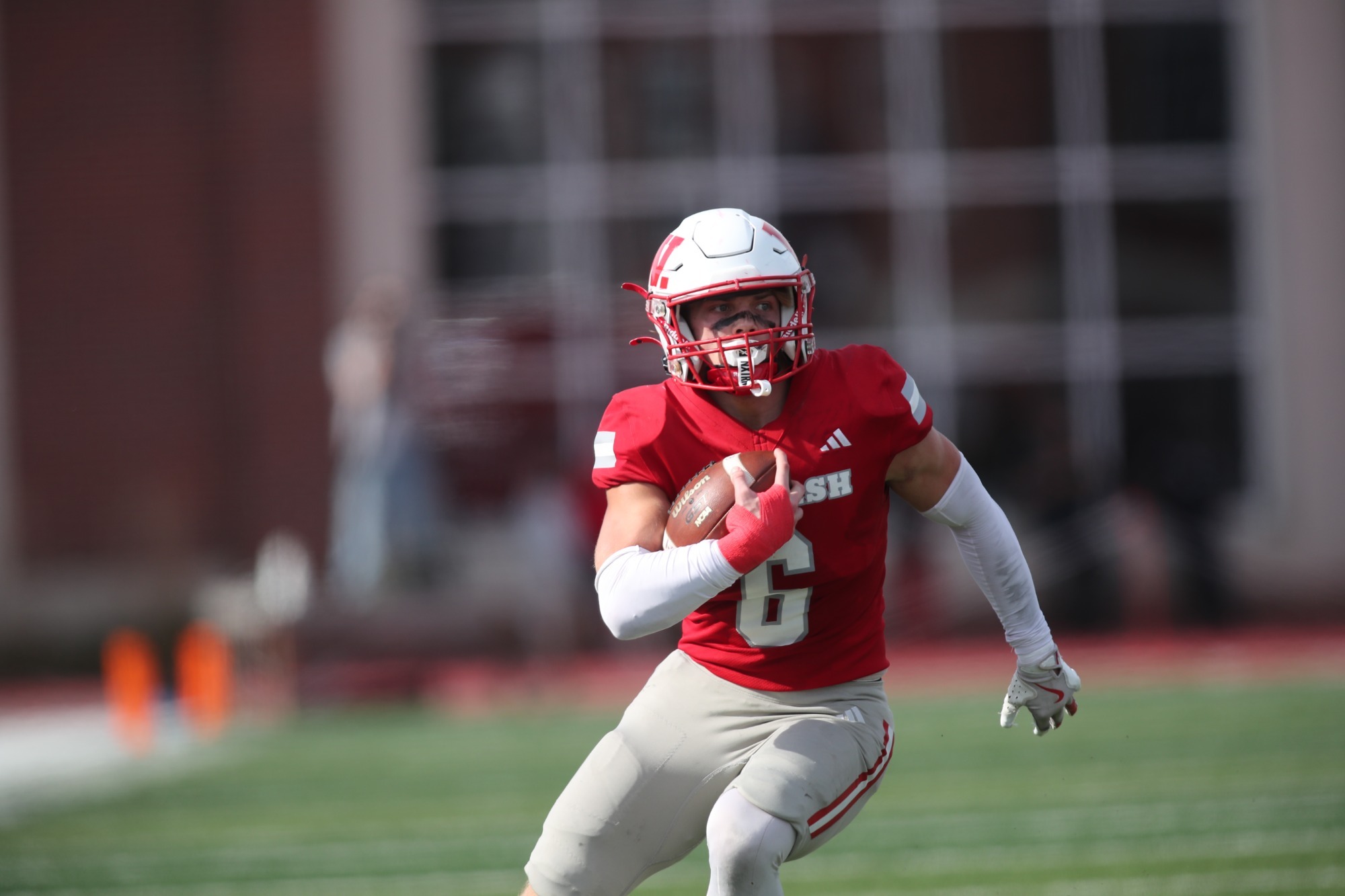 Gage Gulley with one of two interceptions on the afternoon against Washington University in St. Louis.